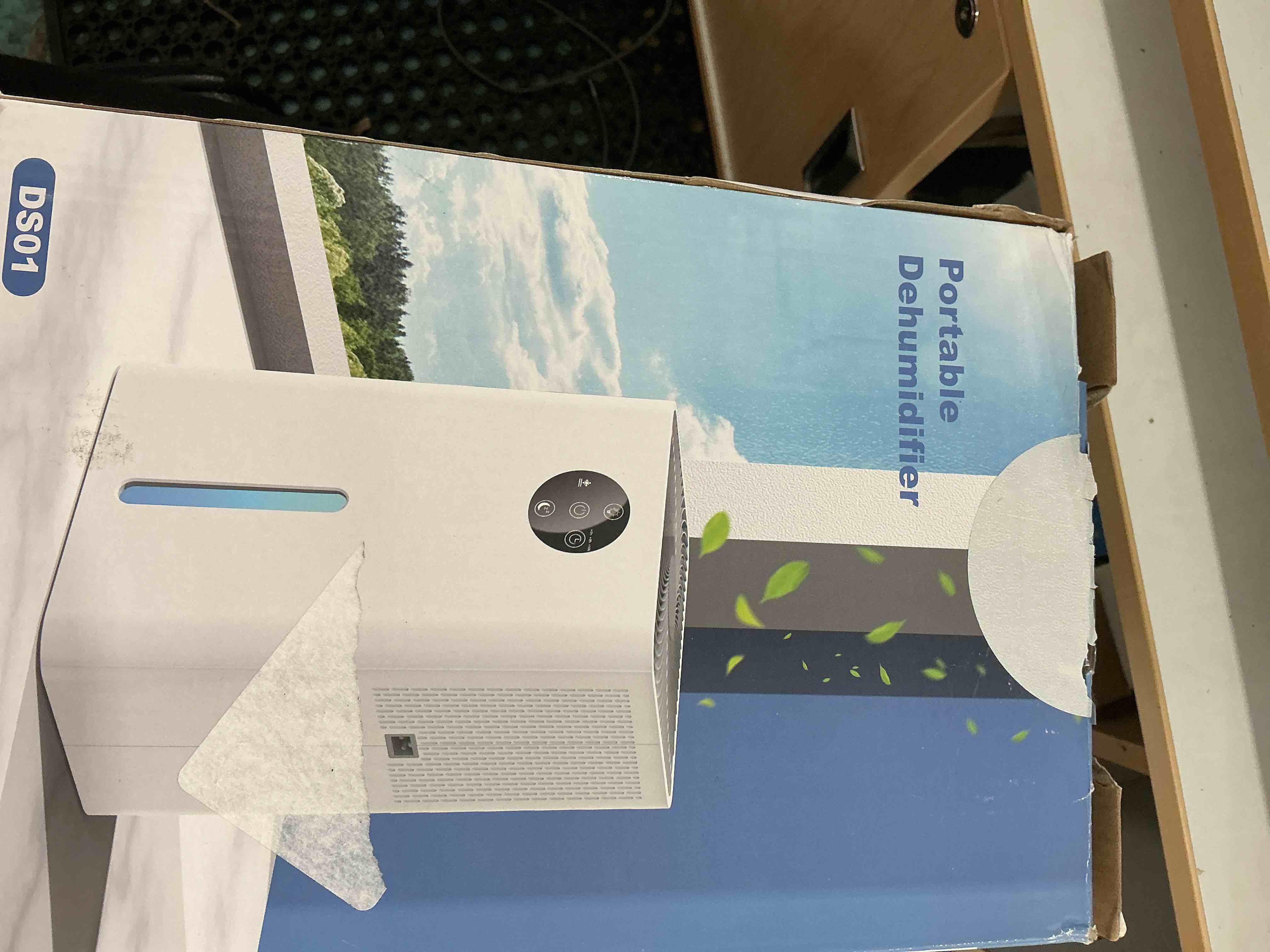 Condition photo showing New/Like New for Dehumidifier, 60 OZ Water Tank, 500 sg.ft. Quiet Dehumidifiers for Home with Auto Shut Off, Auto Defrost, Timer, Sleep Mode, 7 Color Light Dehumidifier for Basement, Bedroom, Bathroom - White