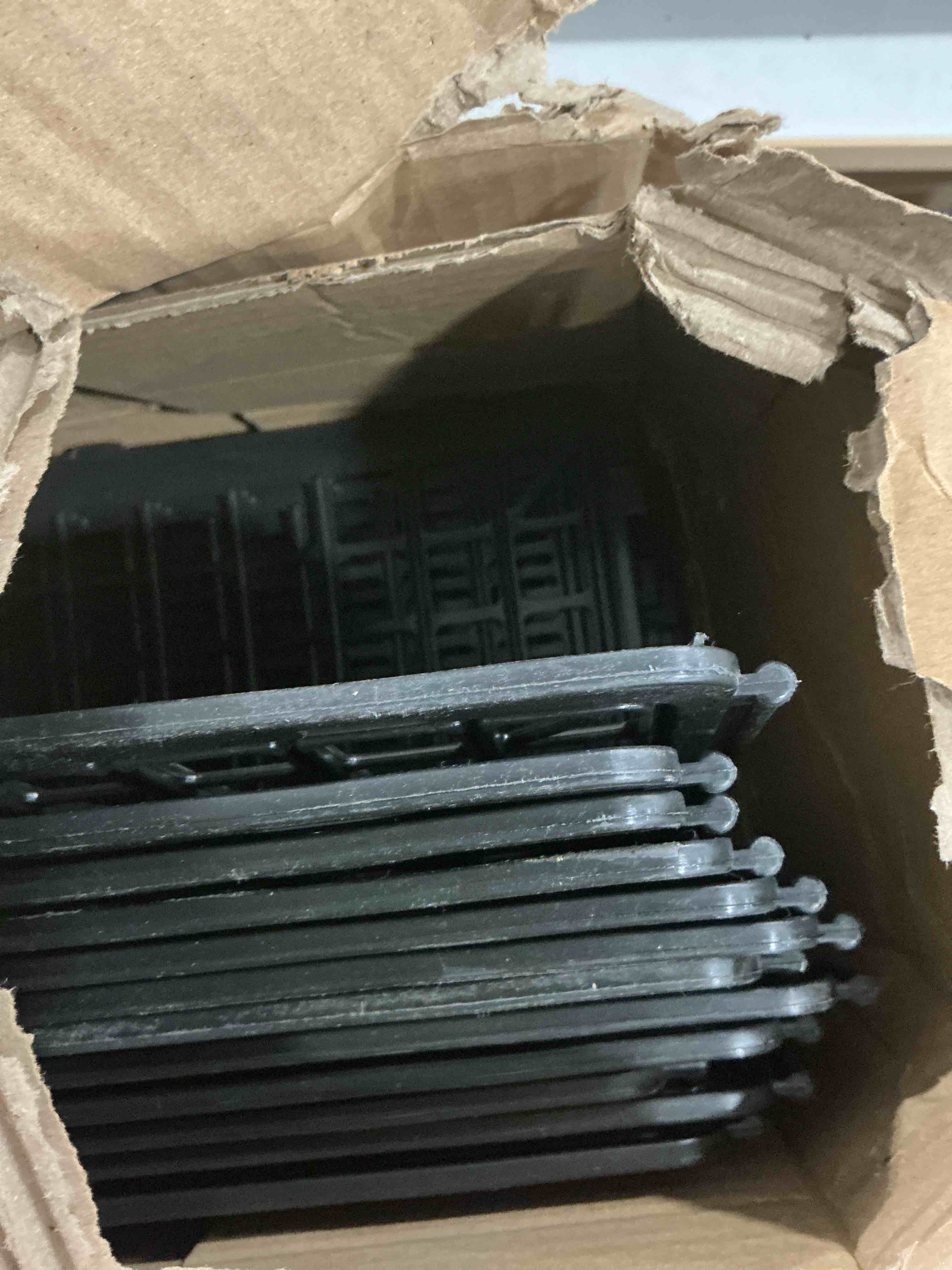 Condition photo showing New/Like New for 12Pcs Under Couch Blockers for Pets, Adjustable Plastic Under Bed Blockers, Furniture Barriers for Toys Dogs Cats (Black)