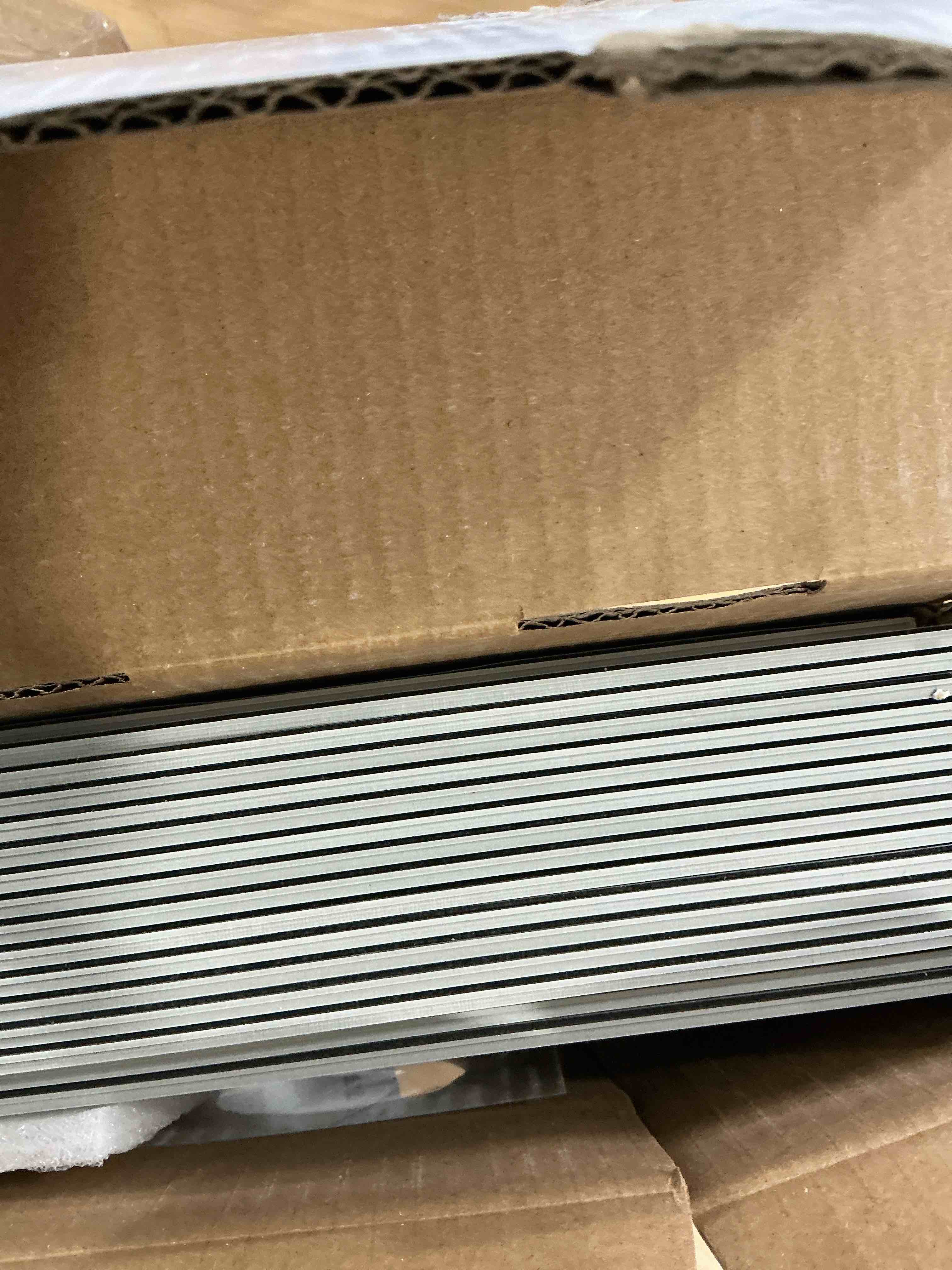 Condition photo showing New/Like New for INNO STCIEKRS 16-Sheet Peel and Stick Floor and Wall Tile for Bathroom Kitchen, 9" x 9" Patterned Star SPC Self-Adhesive Vinyl Flooring Encaustic Groutable Backsplash Tile, Covers 9.12 Sq. Ft. Black Star 9" x 9" (16-Sheet)