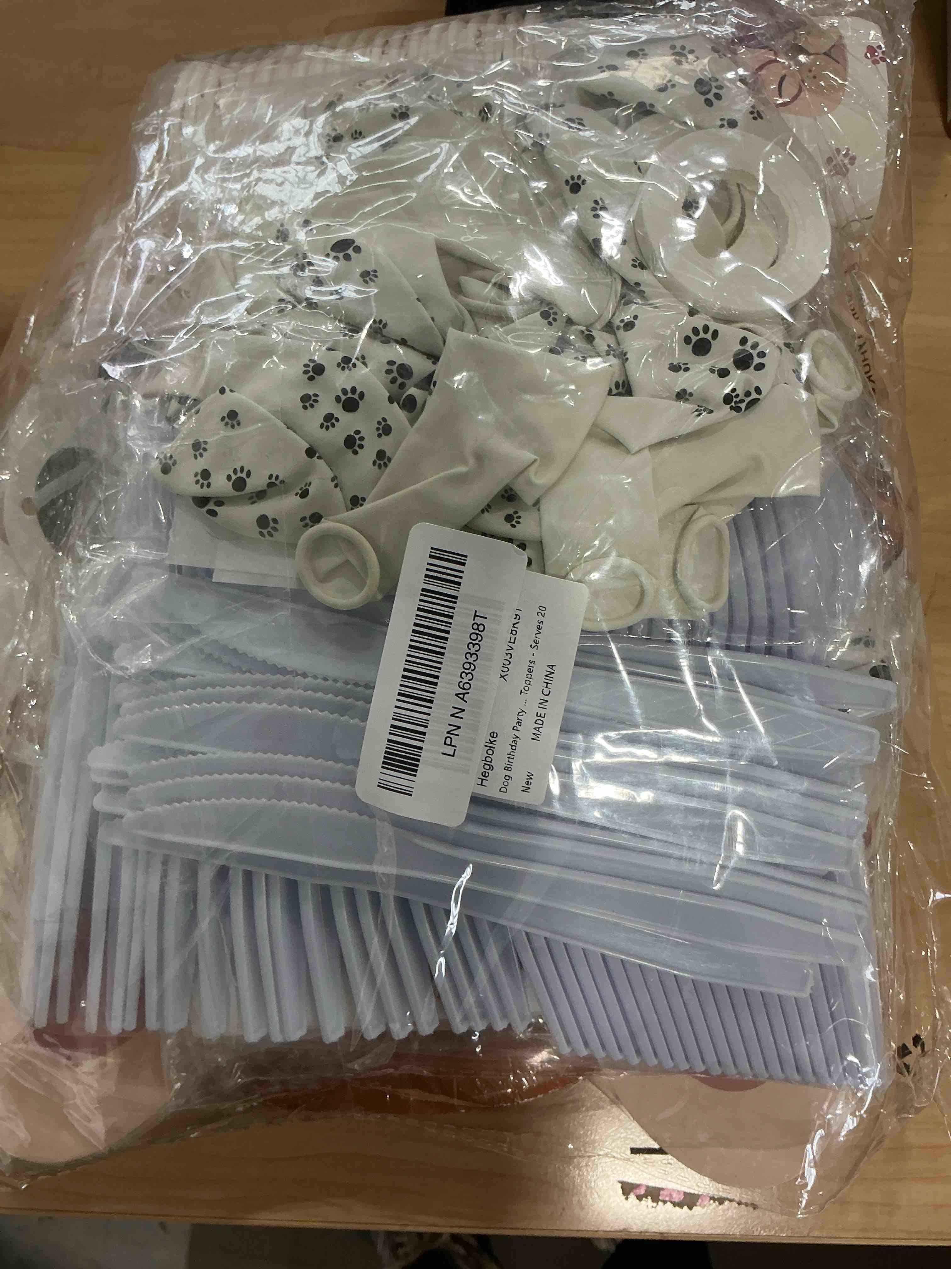 Condition photo showing New/Like New for Dog Birthday Party Supplies - Cut Puppy Dog Paw Party Supplies for Doggy, Kids, Birthday Includes Plates, Cups, Napkins, Tableware, Tablecloth, Banner, Balloons, Cake Toppers - Serves 20