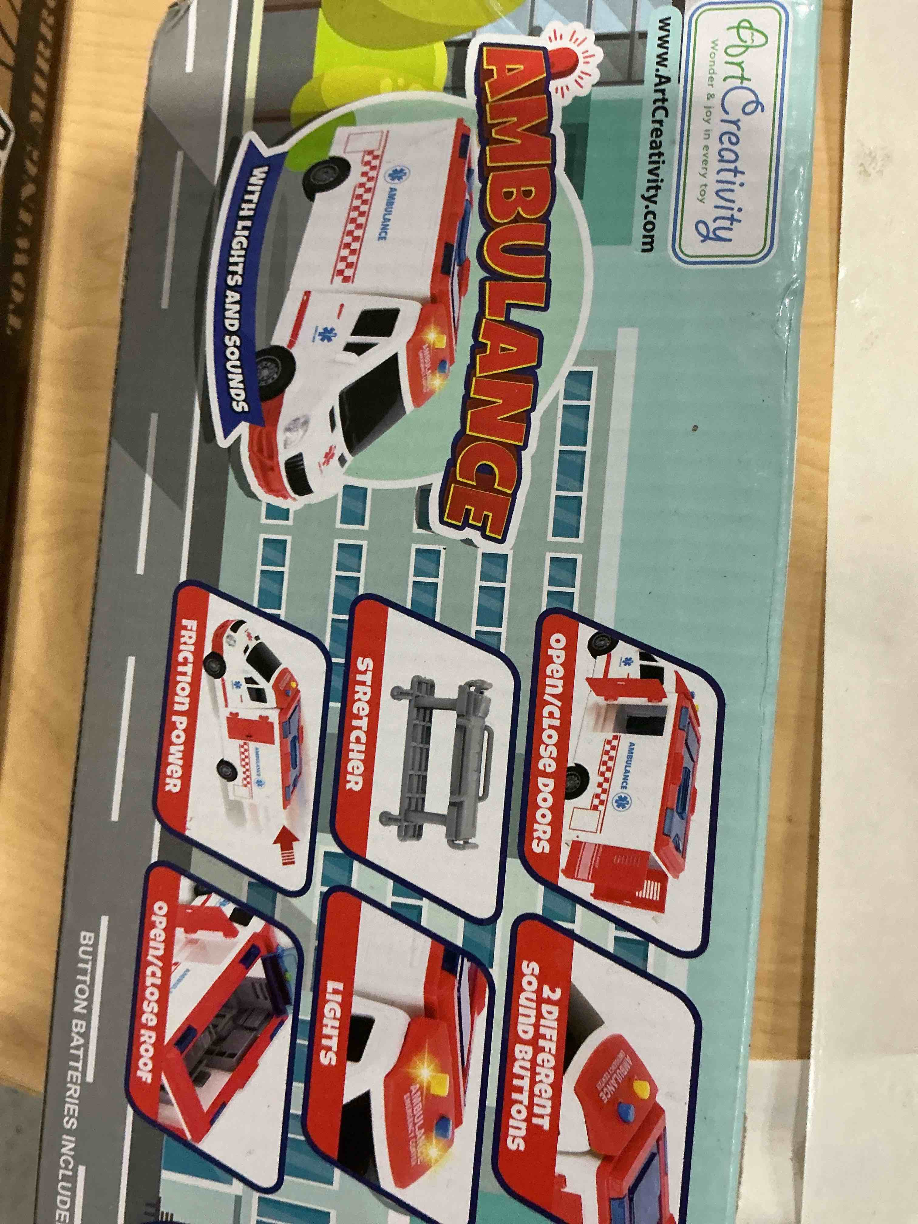 Condition photo showing Good Condition for ArtCreativity Ambulance Toy Truck for Kids, Lights & Siren, Friction-Powered 1/16 Scale Rescue Toy Ambulance, Emergency Vehicle Ambulance Toys for Kids 3-8 with Removable Stretcher, Doors Open