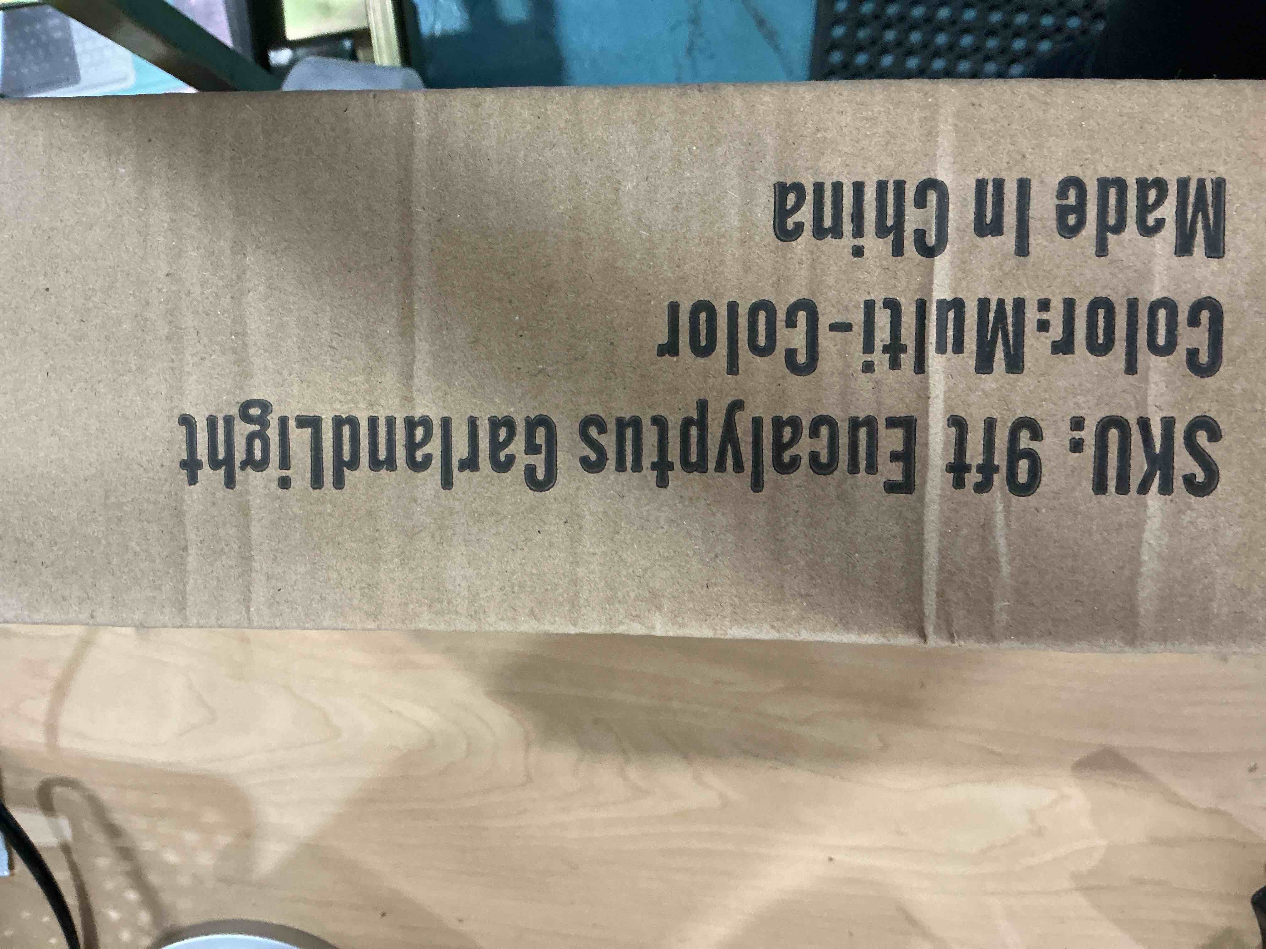 Condition photo showing Good Condition for 9FT Prelit Christmas Garland with Lights, Multi-Color Lights/Battery Operated/Timer, Lighted Artificial Eucalyptus Christmas Garland for Mantle Table Stairs Railing Xmas Indoor Outdoor Decorations