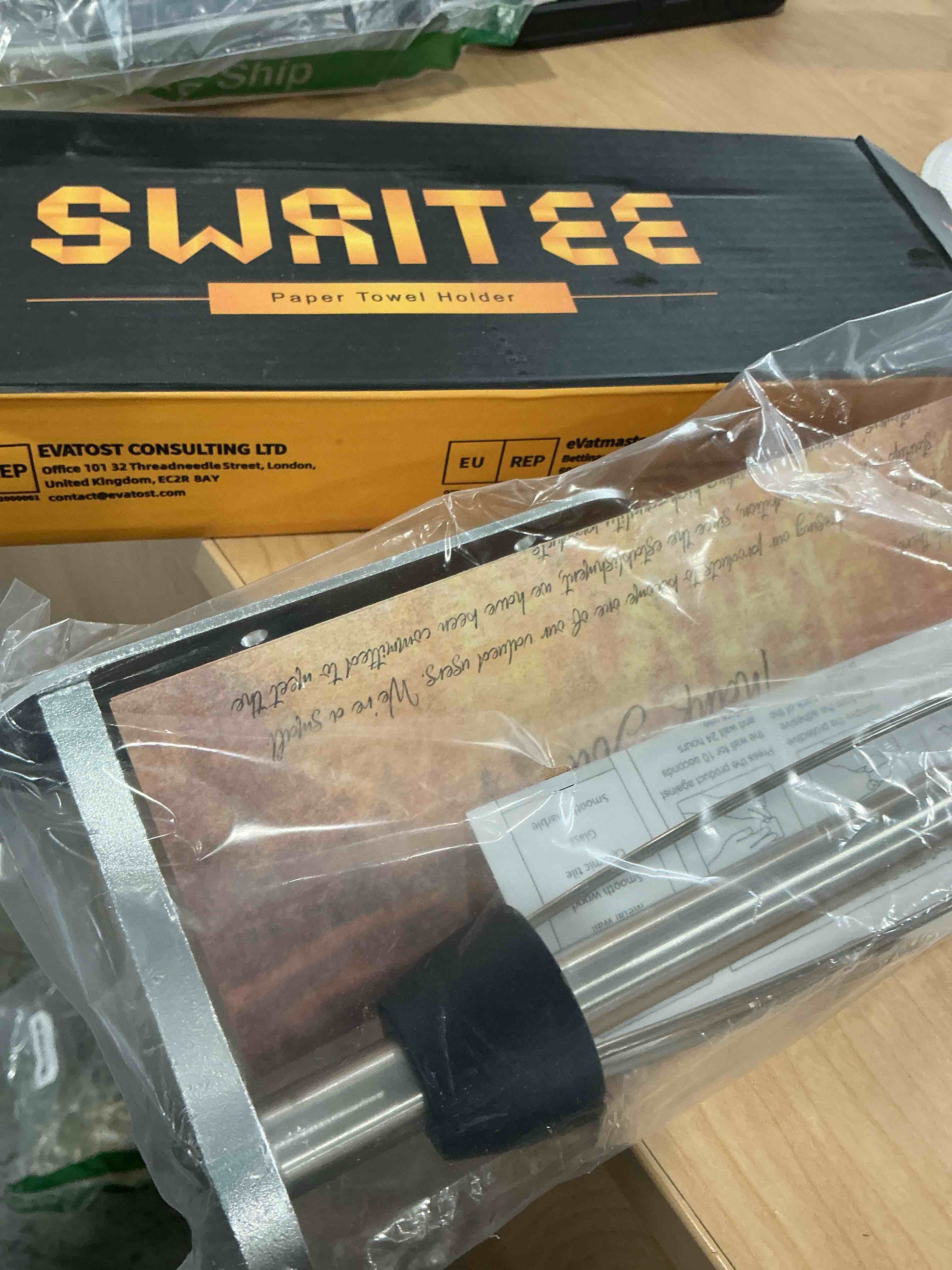 Condition photo showing New/Like New for Paper Towel Holder Under Cabinet, One-Handed Tear, Wall Mount, Adhesive, Silver, Paper Roll Holder with Ratchet Mechanism for Kitchen Bathroom Farmhouse Essentials Decor Accessories