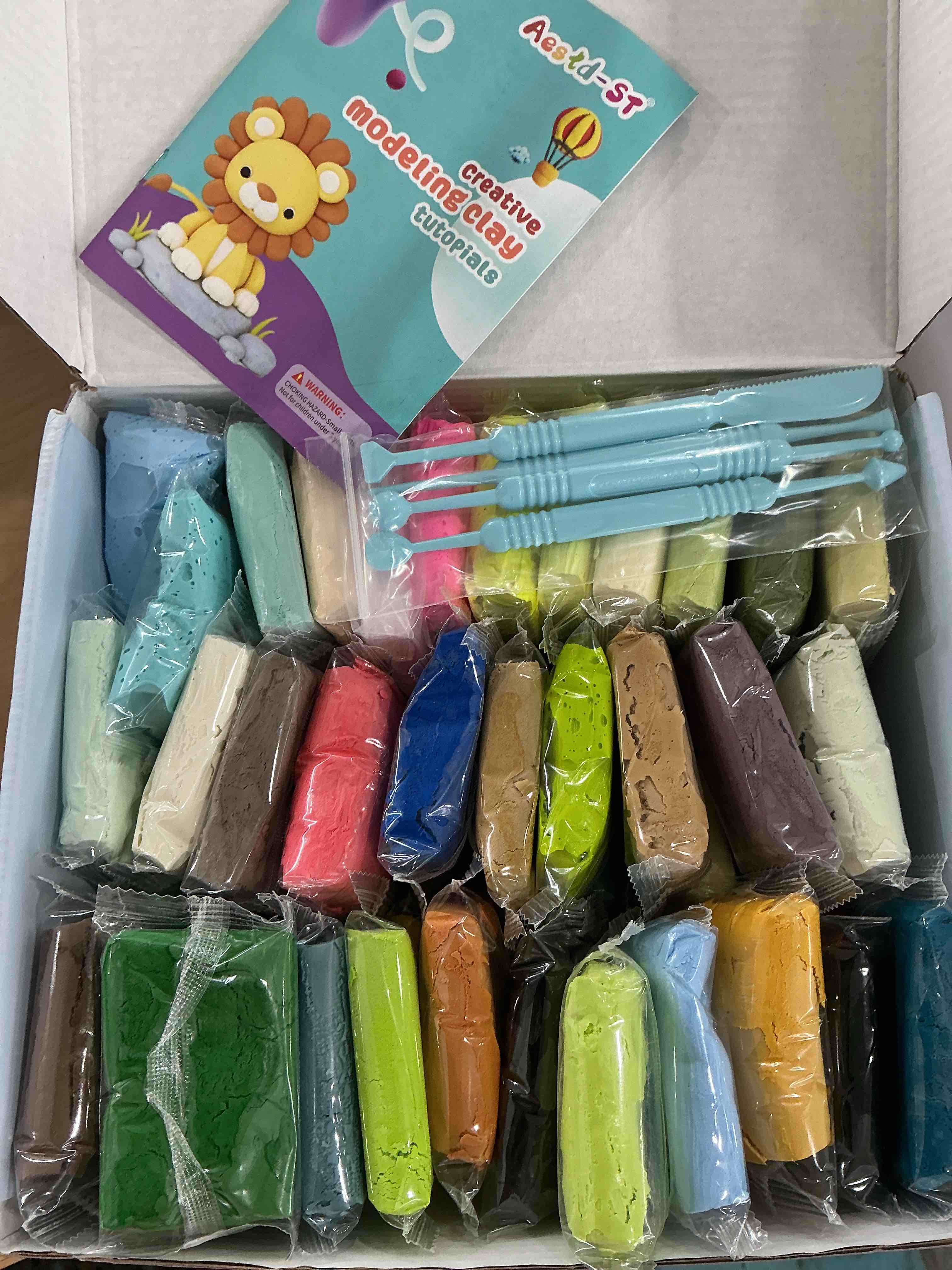 Condition photo showing New/Like New for Air Dry Clay 66 Colors, Modeling Clay for Kids, DIY Model Magic Clay, Molding Clay Kit with Sculpting Tools, Non-Sticky Soft and Super Light, Arts and Crafts Gift for Boys Girls Kids