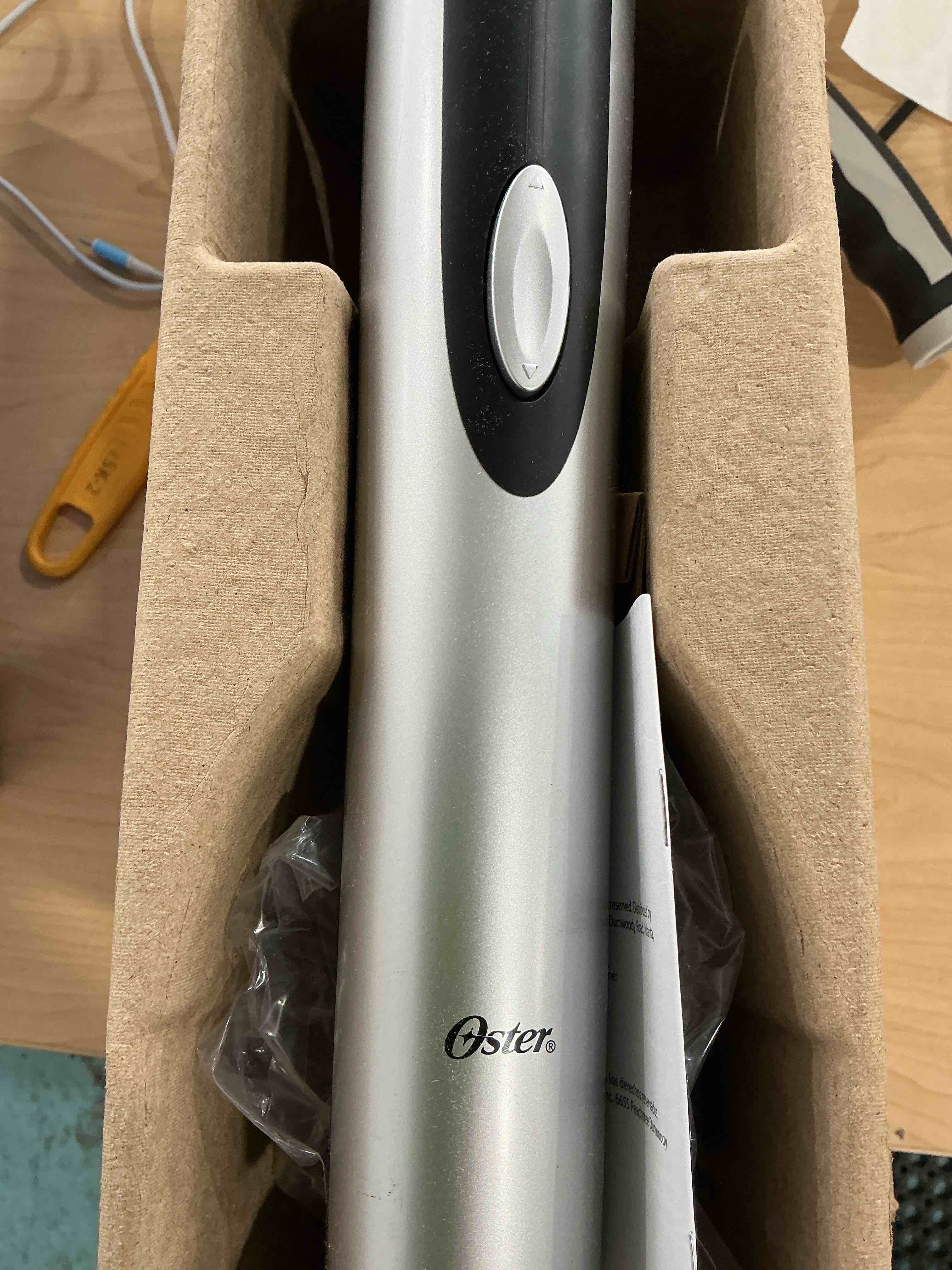 Condition photo showing Good Condition for Oster Cordless Electric Wine Bottle Opener with Foil Cutter, Silver