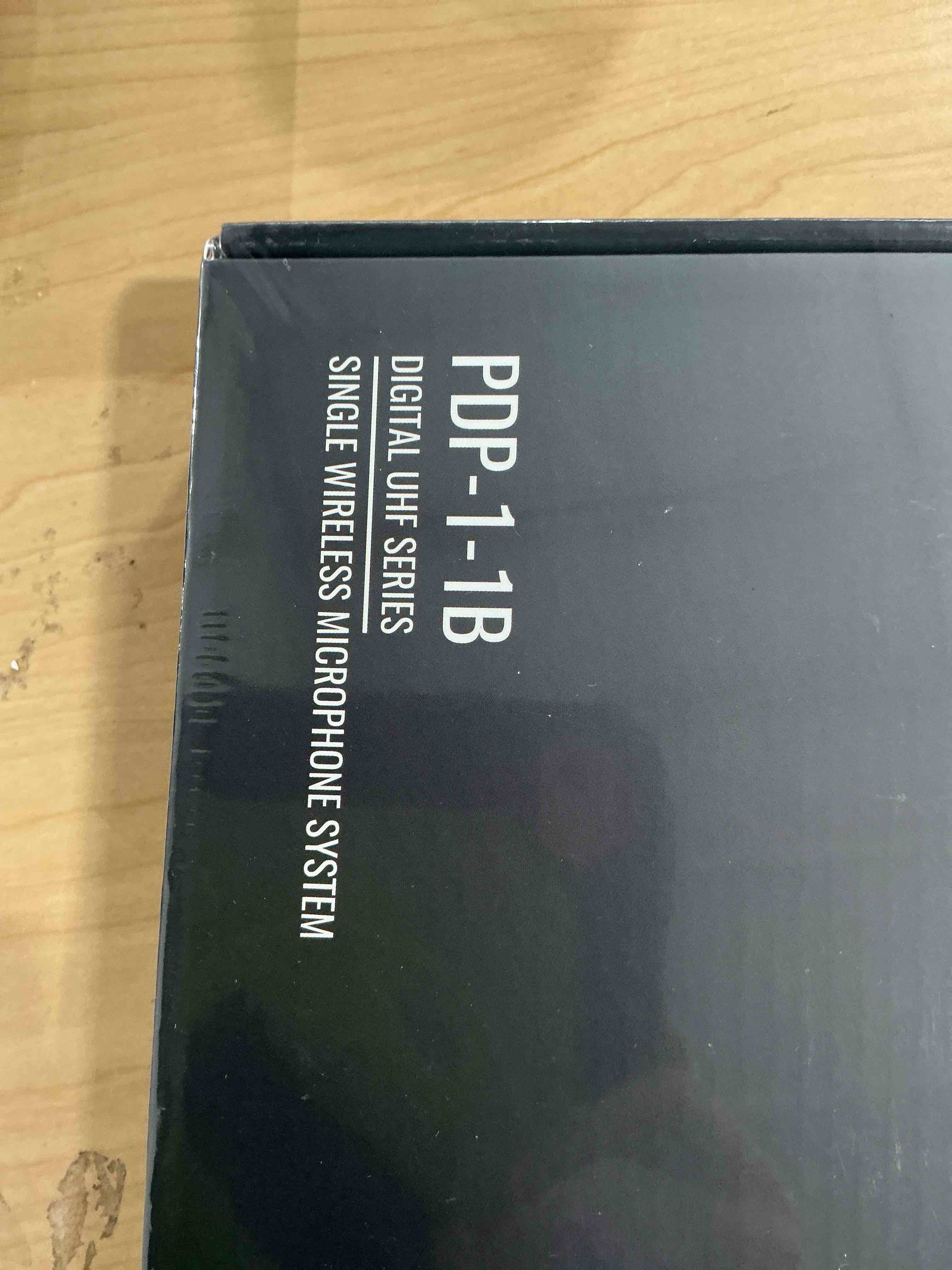 Condition photo showing New/Like New for Phenyx Pro Single Digital Wireless Microphone System, w/Mini Receiver, Bodypack Transmitter,15 Channels in 900MHz UHF Band, Headset/Lapel Microphone for Karaoke, Singer, Church, Wedding (PDP-1-1B)