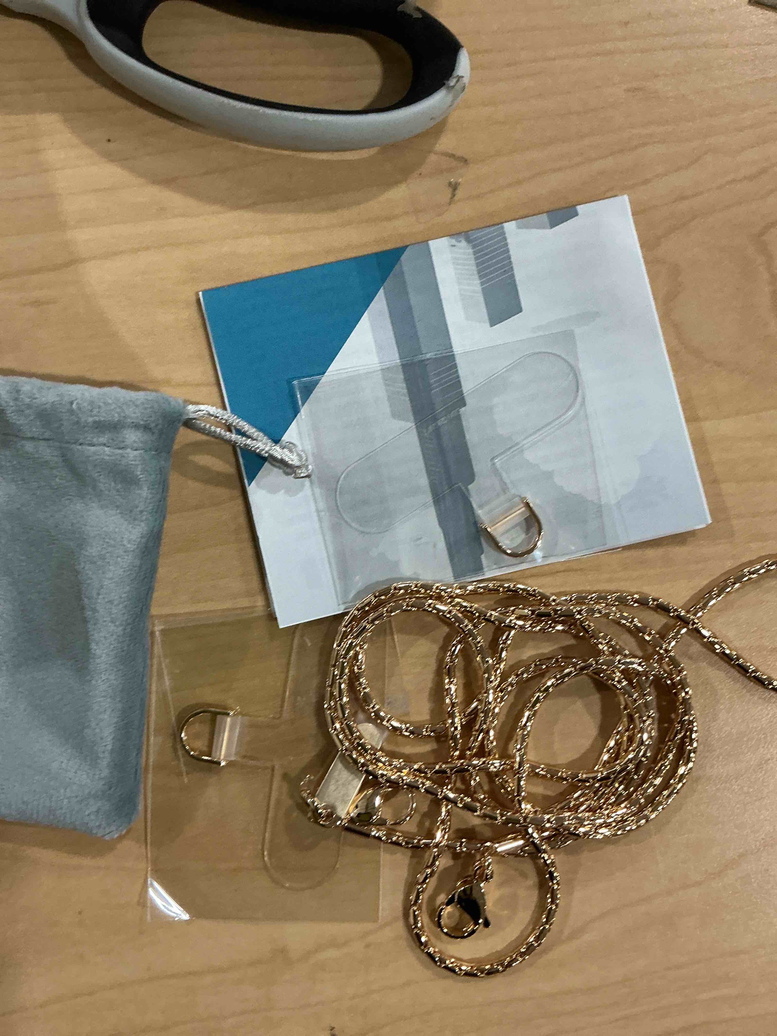 Condition photo showing New/Like New for Metal Cell Phone chain Crossbody Phone lanyard with 2 Tether Tabs Detachable iPhone Chain Crossbody Strap,Non-rusting,Solid,iPhone Lanyard for Women Girls Travel Shopping Party Camping Bright Gold Long