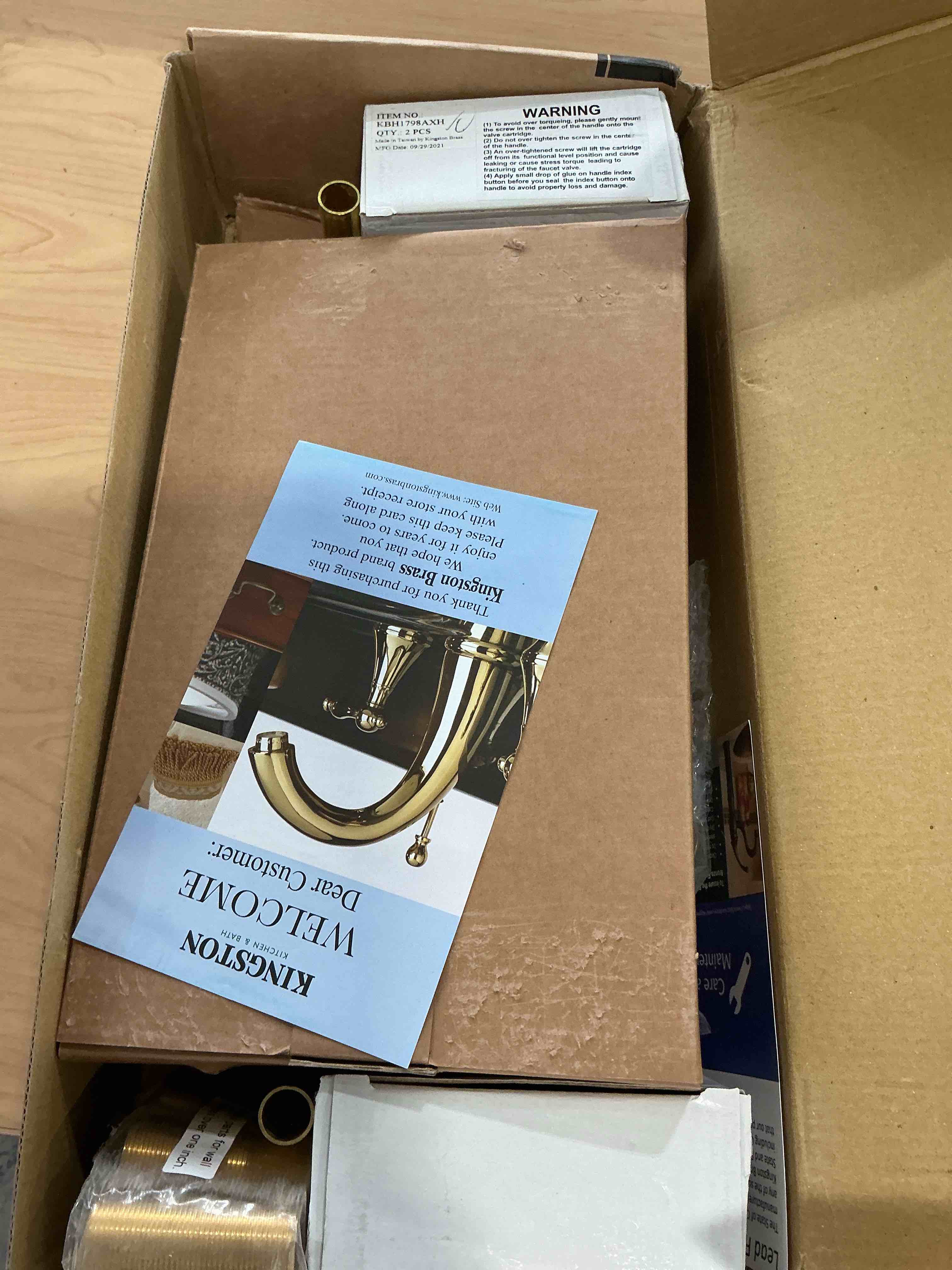 Condition photo showing As Is for Kingston Brass KS3227AX Vintage 6" Adjustable Center Wall Mount Kitchen Faucet, Brushed Brass