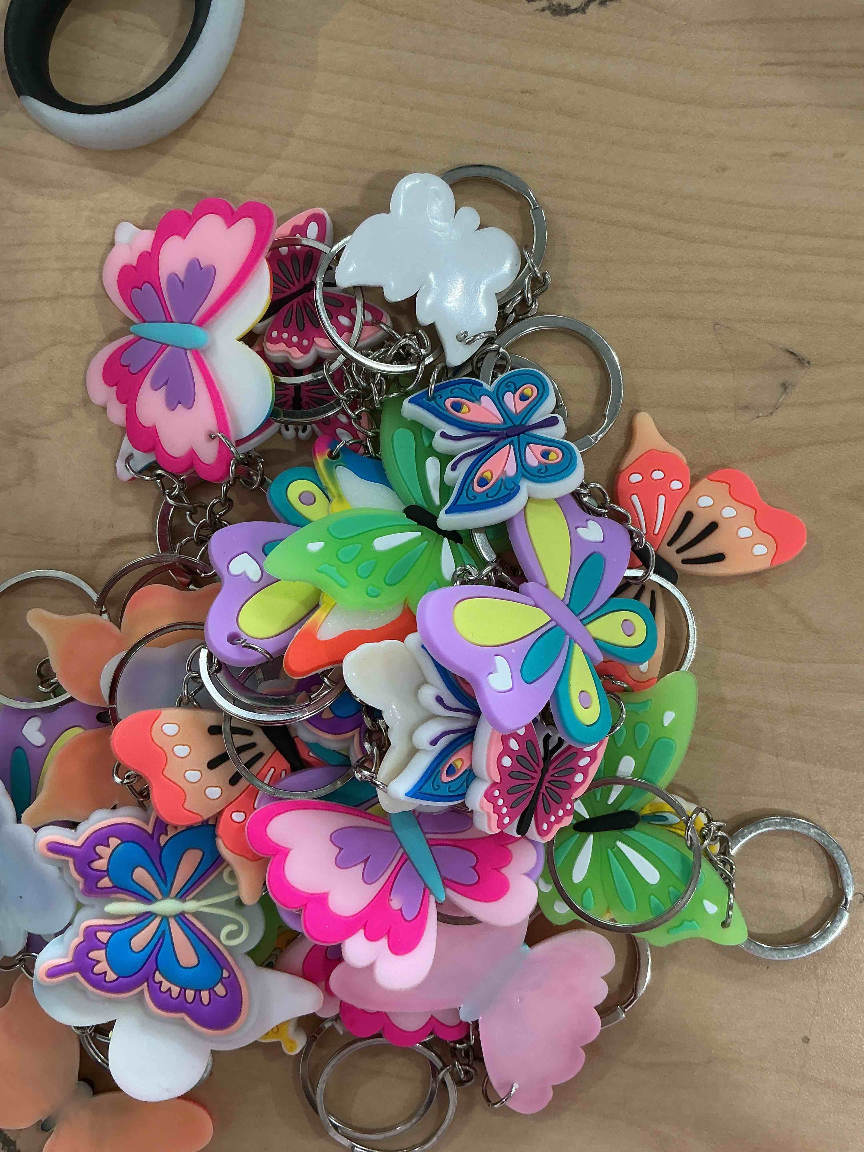 Condition photo showing New/Like New for Sasylvia 36 Pcs Butterfly Party Favors Butterfly Keychains Bulk Fairy Spring Party Favors Valentines Day Gifts Birthday Decorations for Women Men Bag Charms Accessories, 9 Styles 36 Butterfly