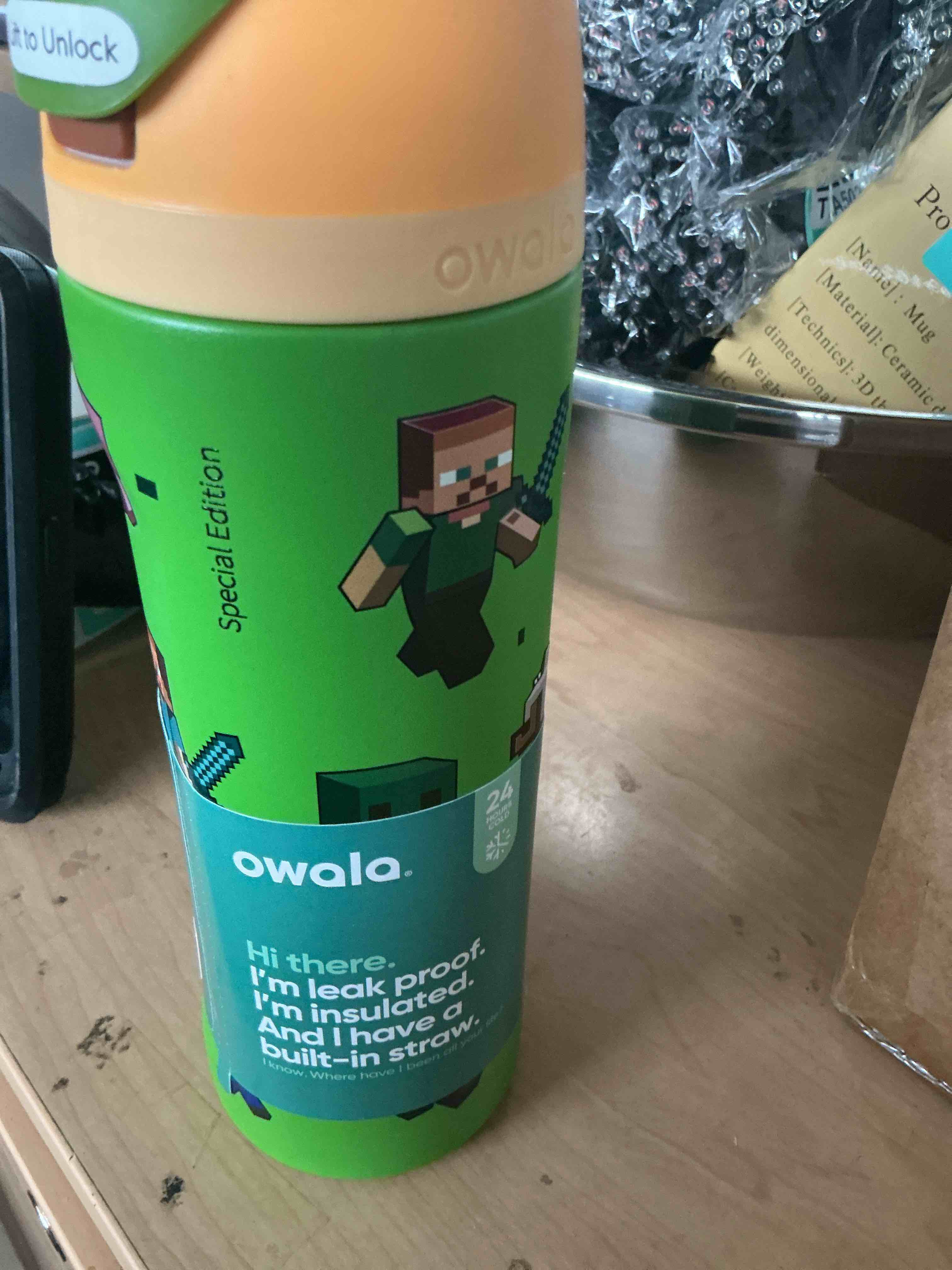 Condition photo showing New/Like New for owala minecraft boom green 24 oz stainless steel water bottle