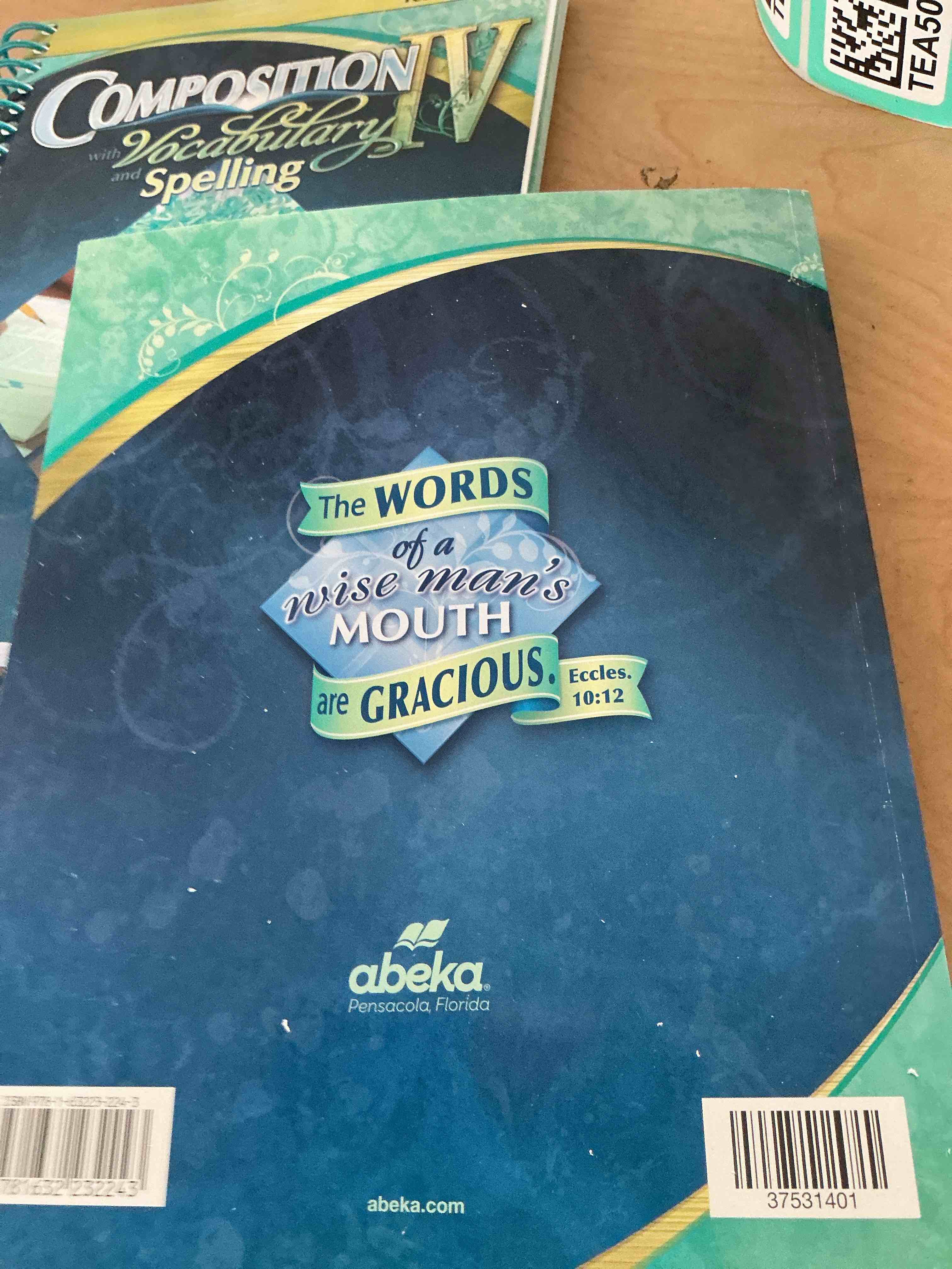 Condition photo showing New/Like New for compositioniv with vocabulary and spelling workbook with teacher key