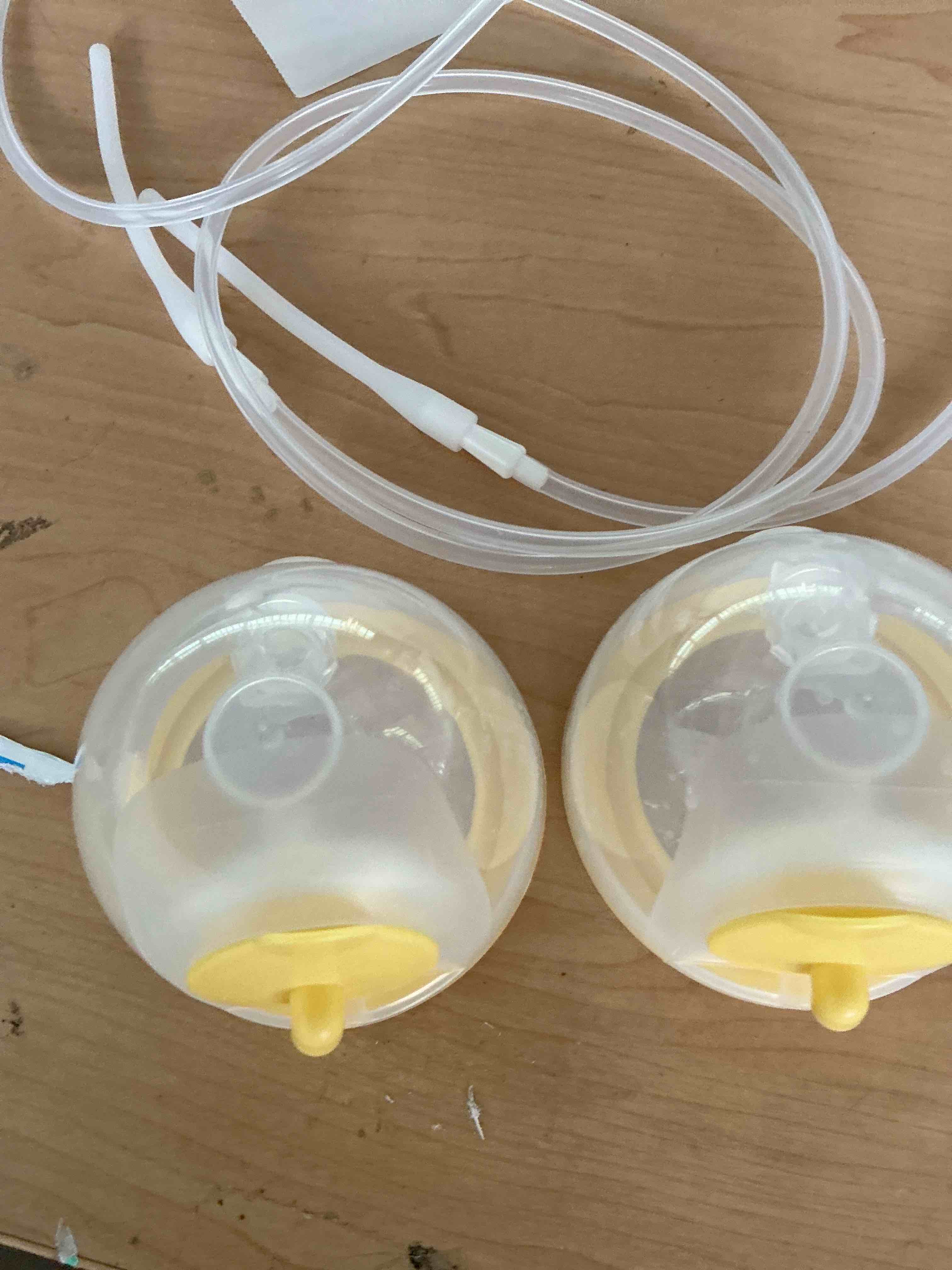 Condition photo showing As Is for medela hands-free collection cups, compatible with freestyle flex, pump in style with maxflow, and swing maxi electric breast pumps, 1 set of 2 cups