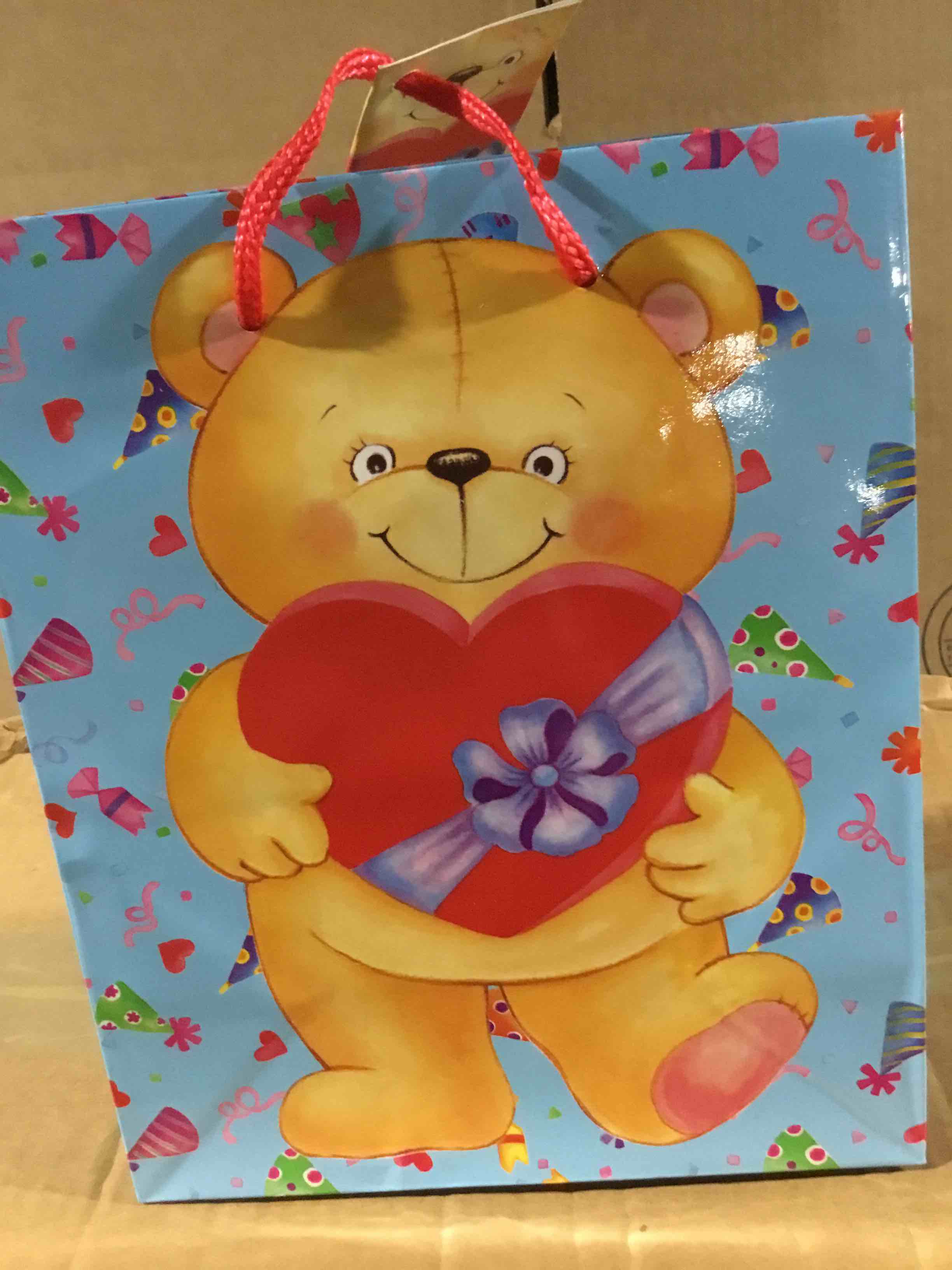 Condition photo showing New/Like New for box of 144 gift bag bear heart