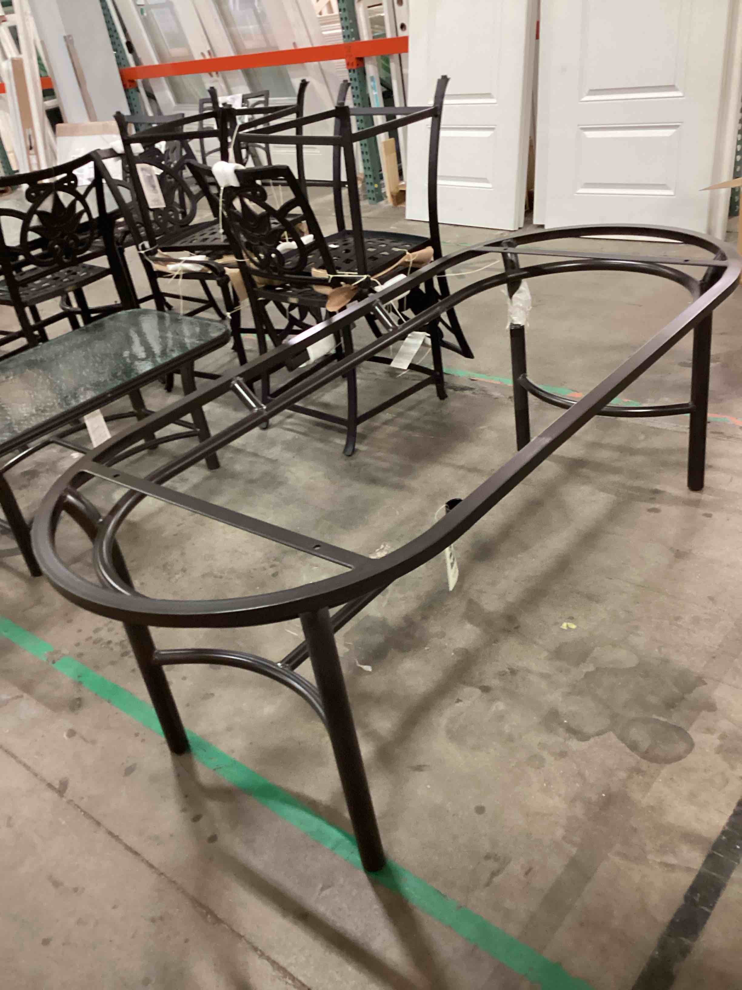Oval Metal DiningTable with Umbrella Hole, In Dark Brown by Mallin Casual Furniture( See Description)