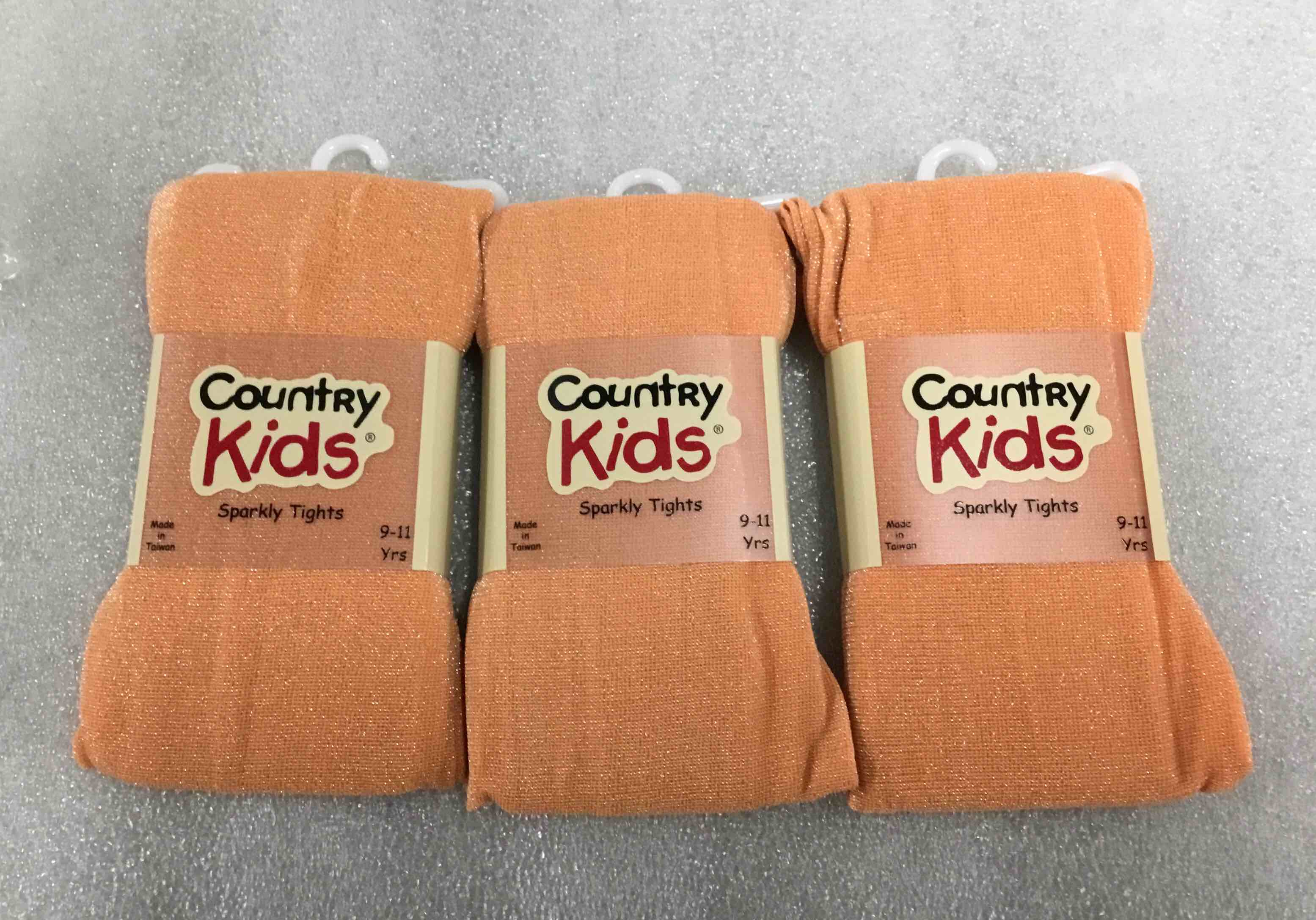 Size 9-11 Country Kids Sparkly Orange Tights.
