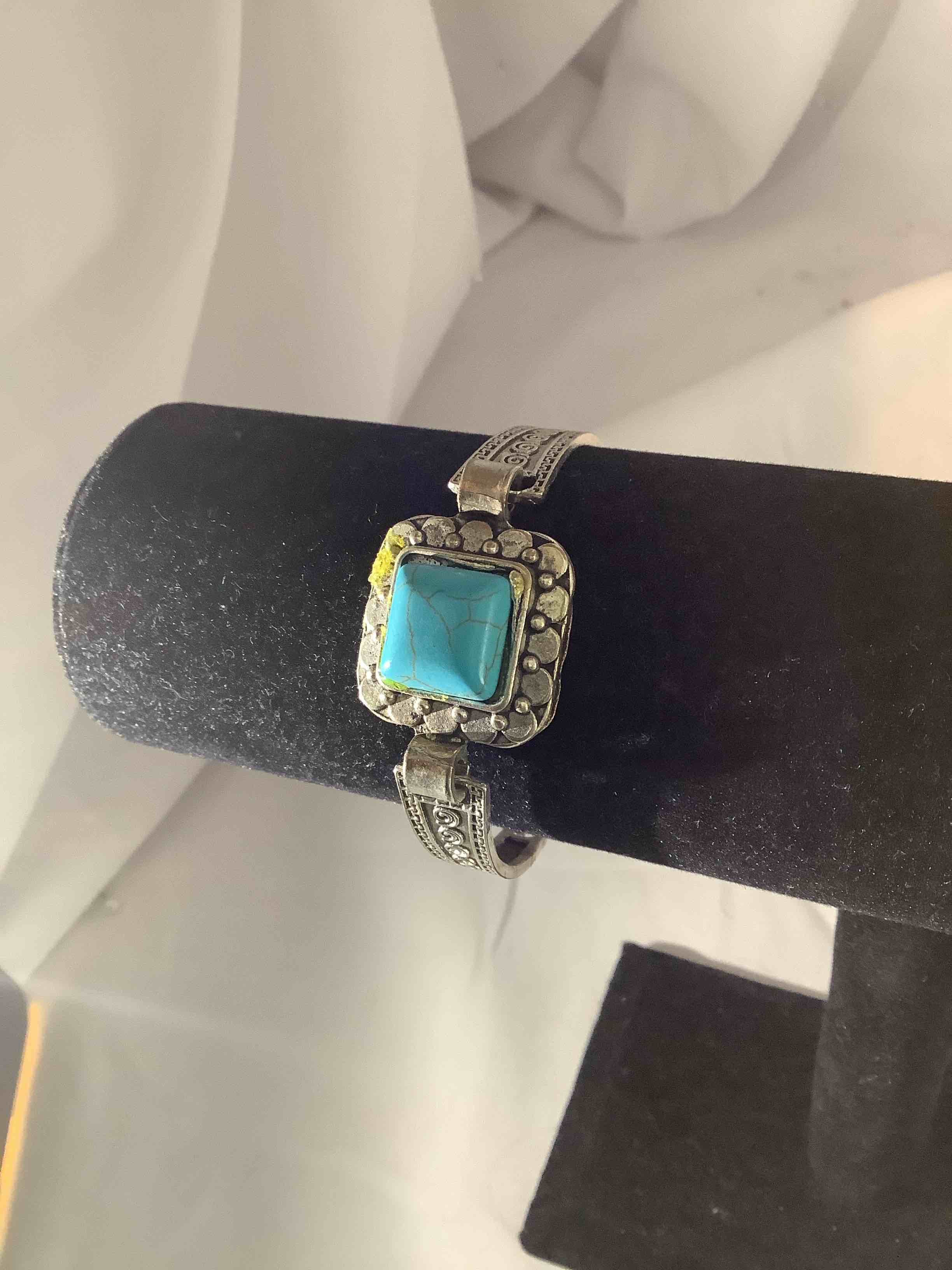 Condition photo showing New/Like New for blue topaz bracelet