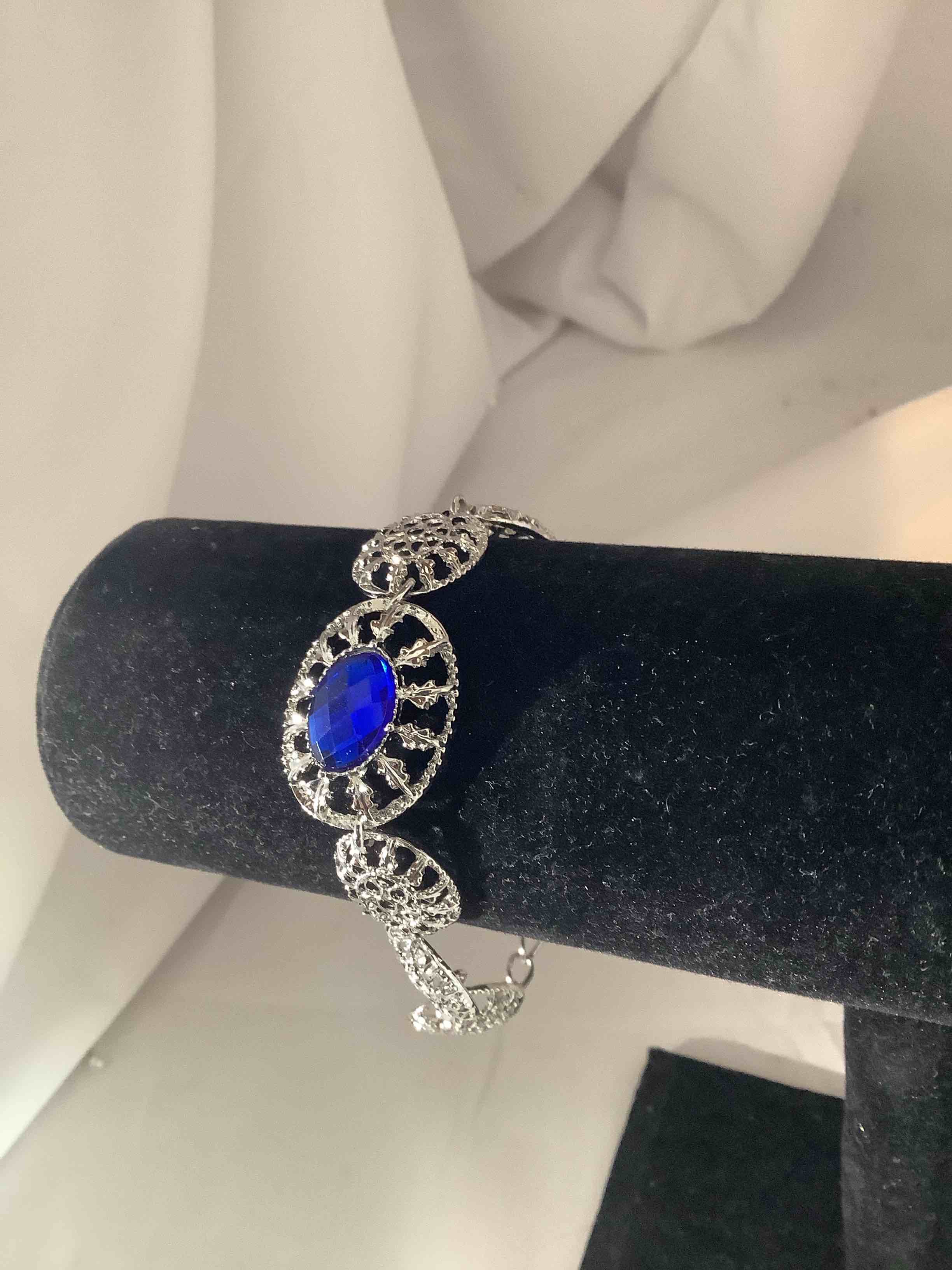 Condition photo showing New/Like New for sapphire bracelet