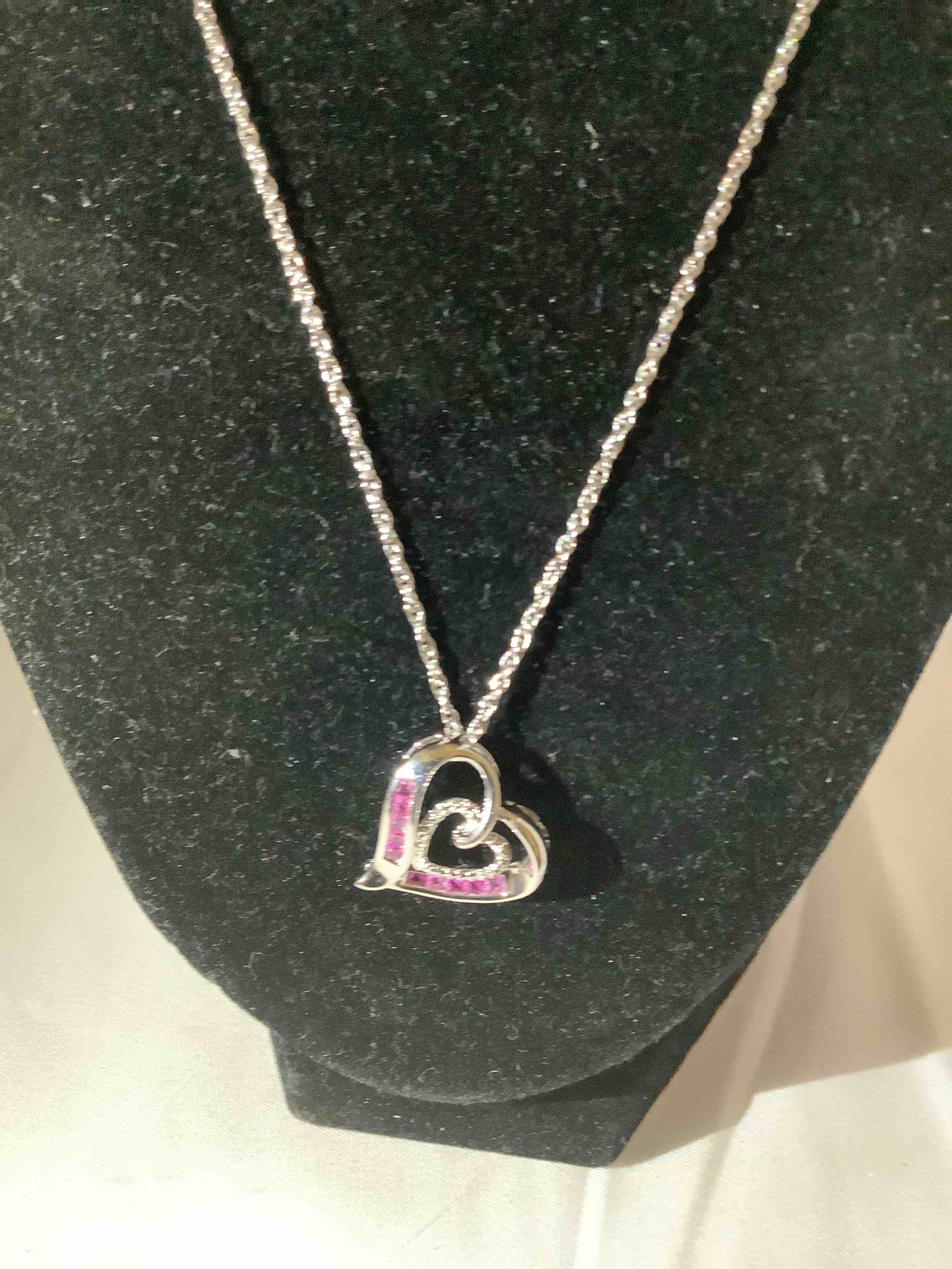 Condition photo showing New/Like New for pink sapphire necklace