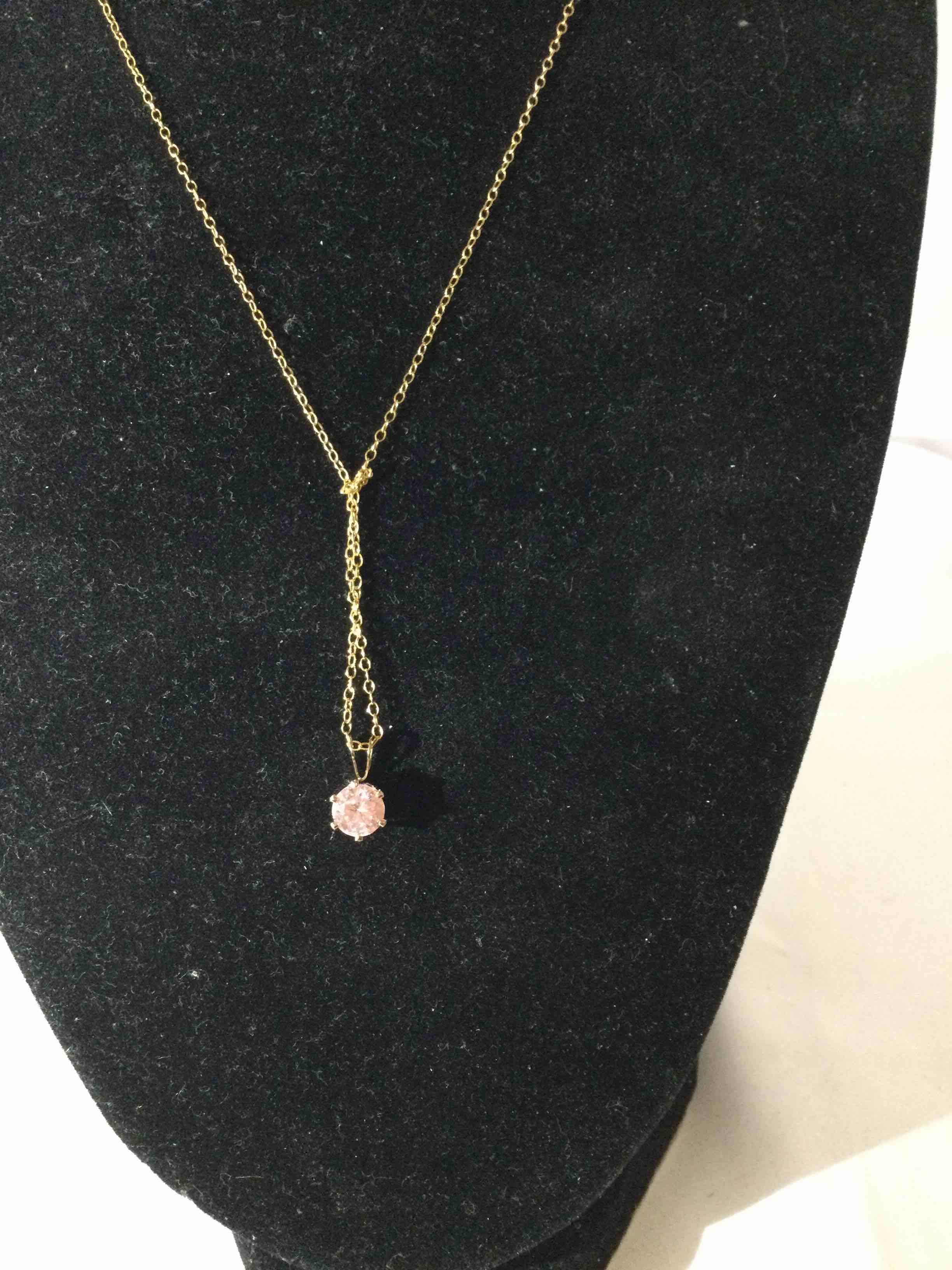 Condition photo showing New/Like New for pink sapphire necklace