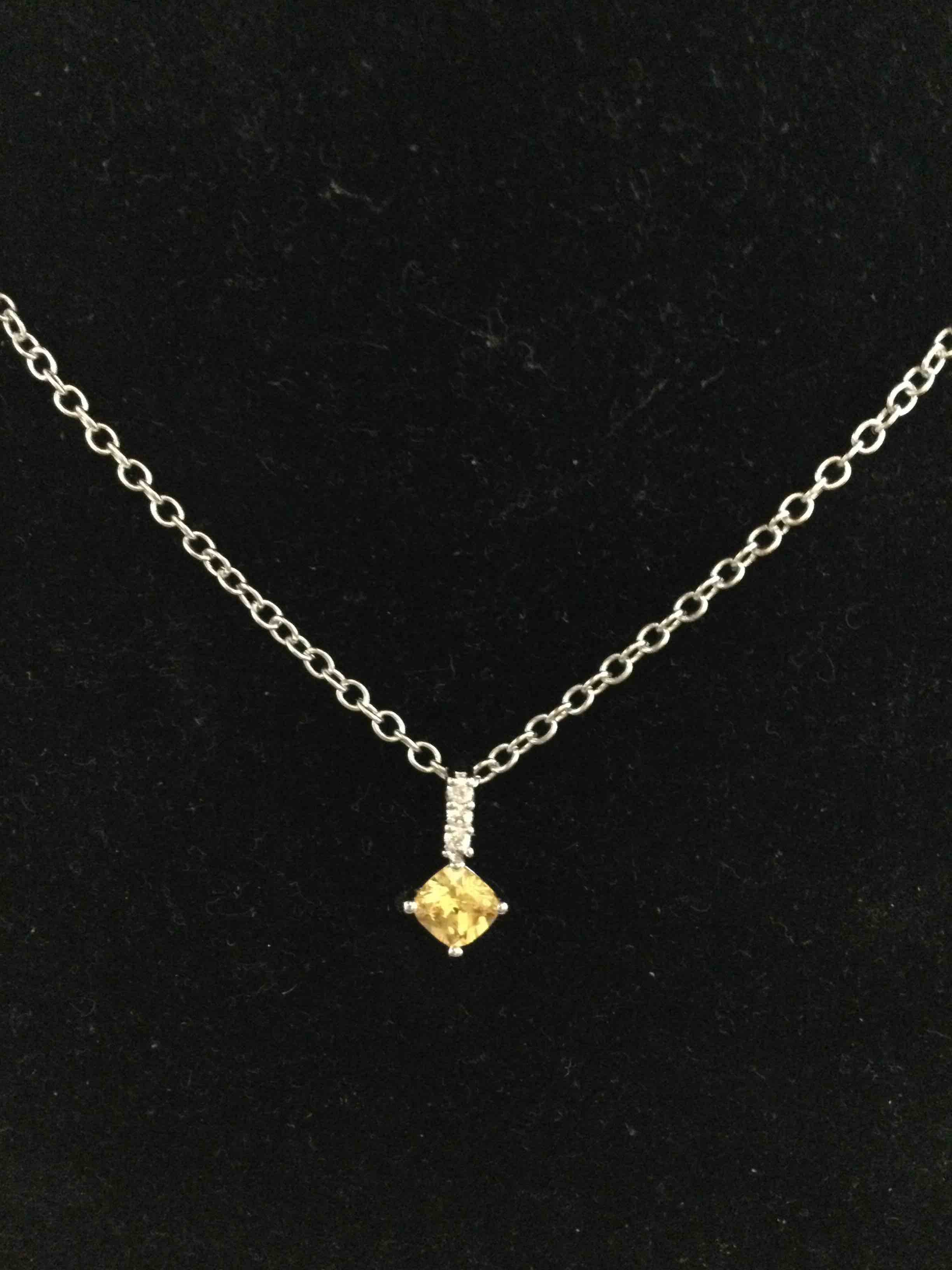 Condition photo showing New/Like New for citrine and white topaz necklace