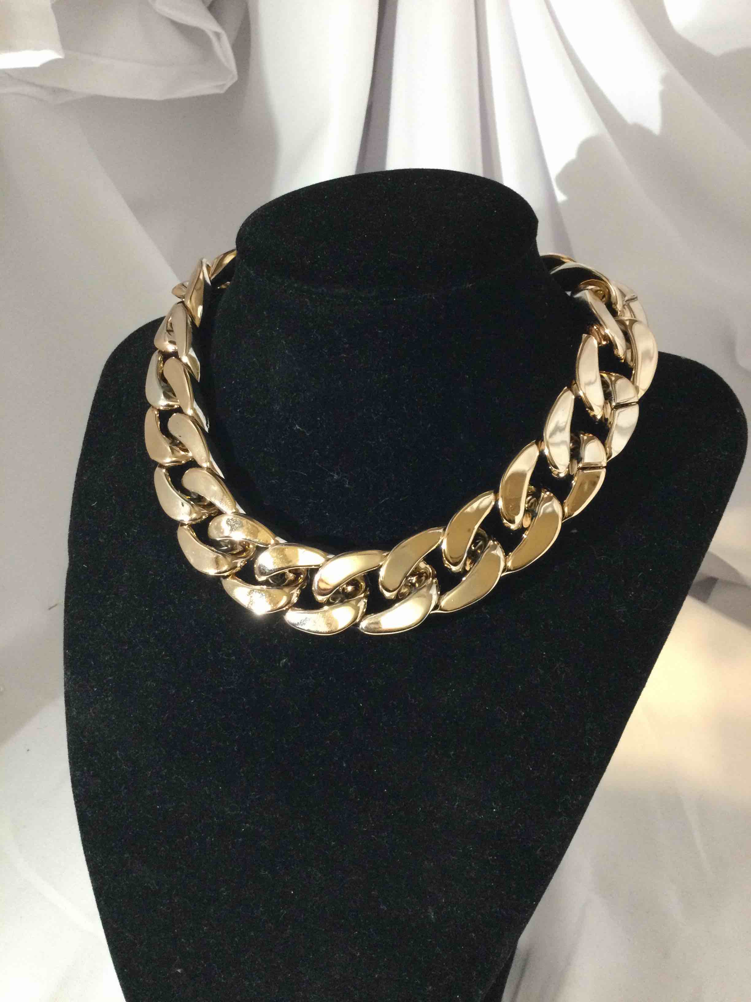 Condition photo showing New/Like New for designer necklace