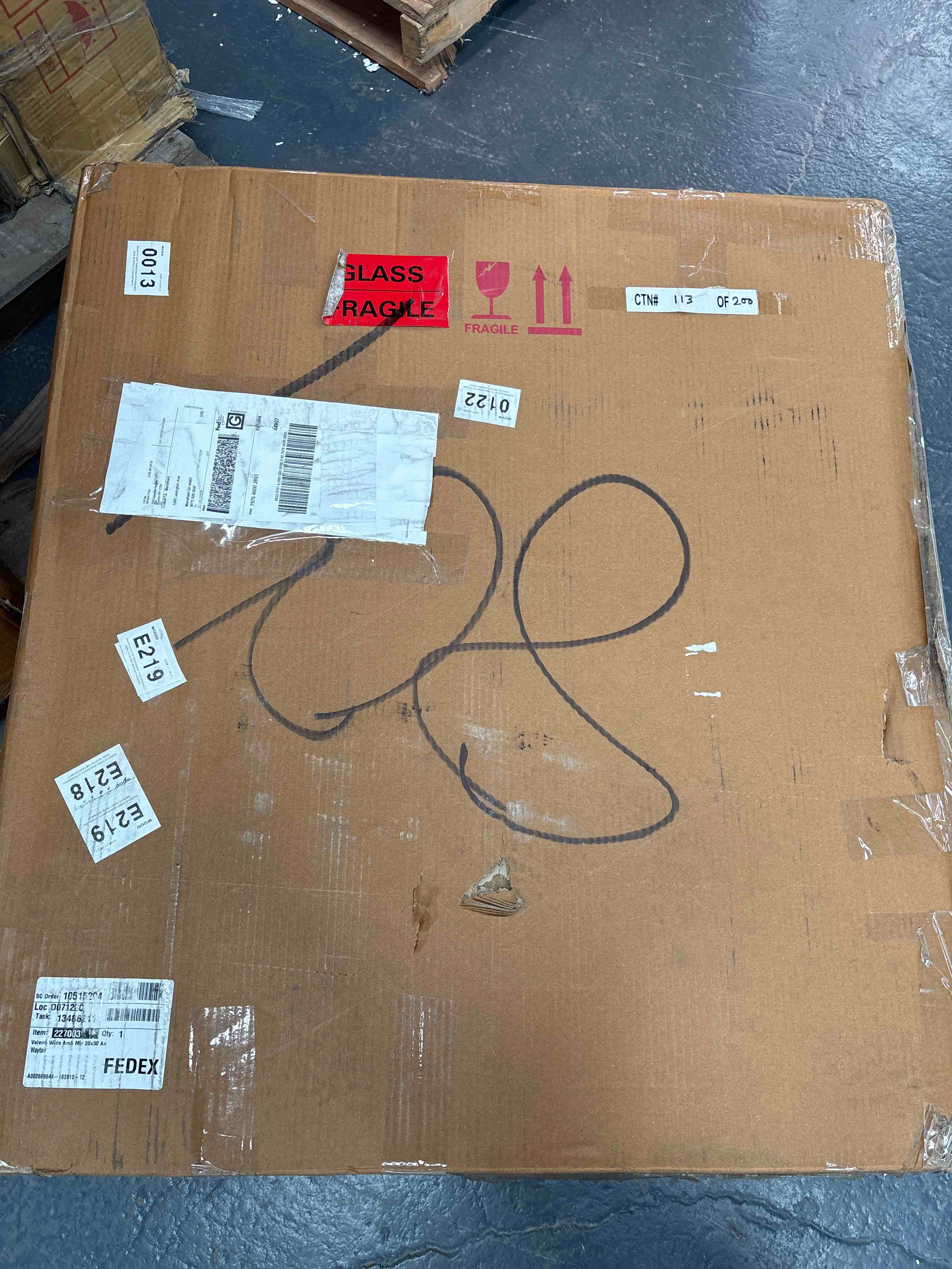 Condition photo showing Good Condition for Metal Arch Wall Mirror(unsure if complete)(MIRROR IS BROKEN)