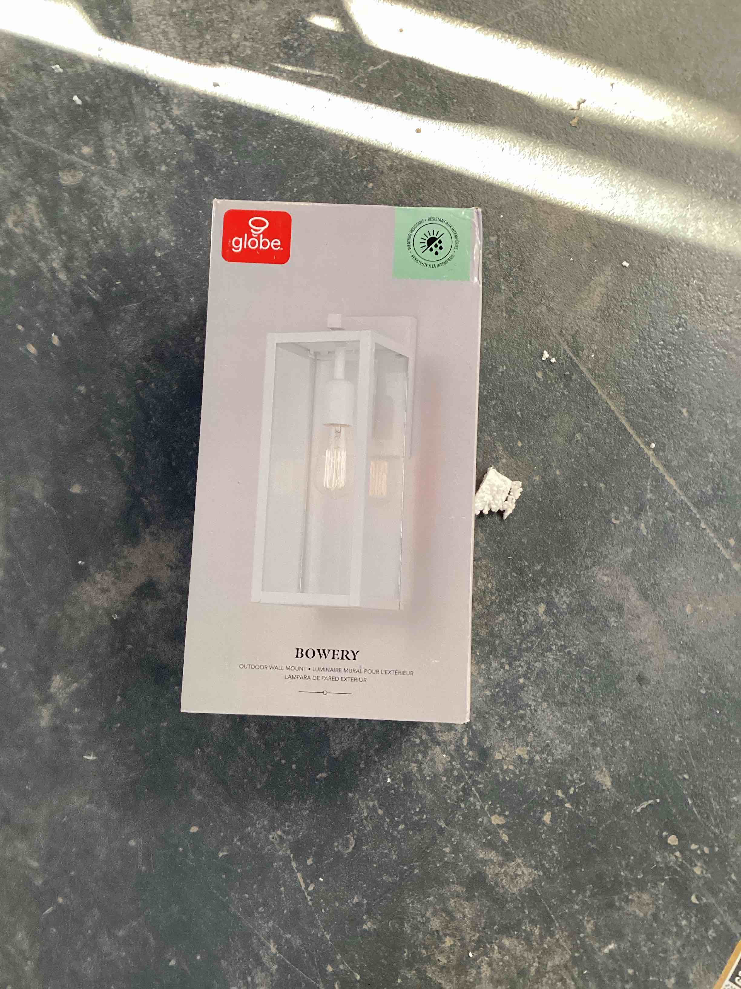 Condition photo showing Good Condition for (ONE PANE IS BROKE) Globe Electric 44836 Bowery 1-Light Outdoor Indoor Wall Sconce, Matte White, Clear Glass Shade, Bulb Not Included