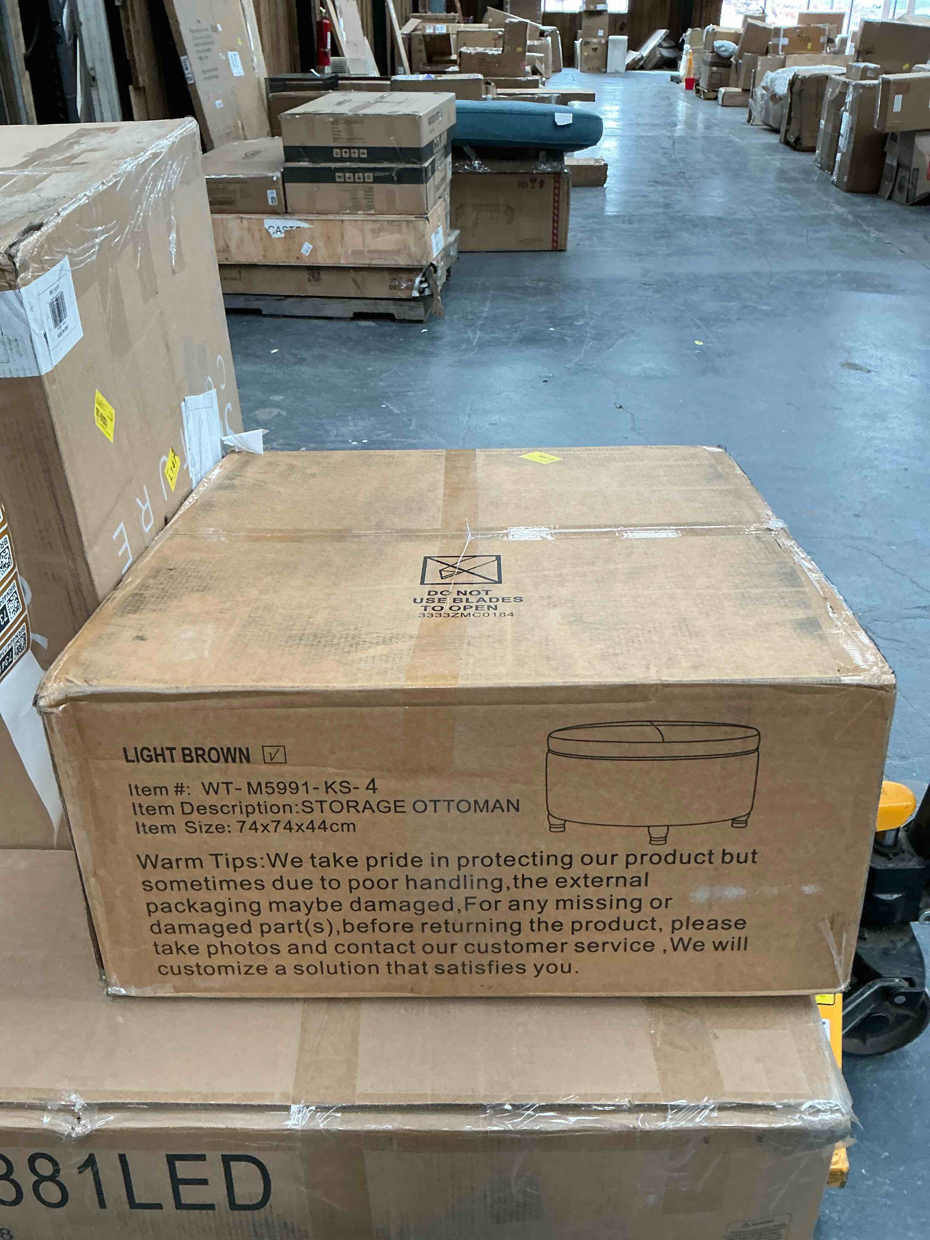 Duanys Faux Leather Upholstered Round Storage Ottoman