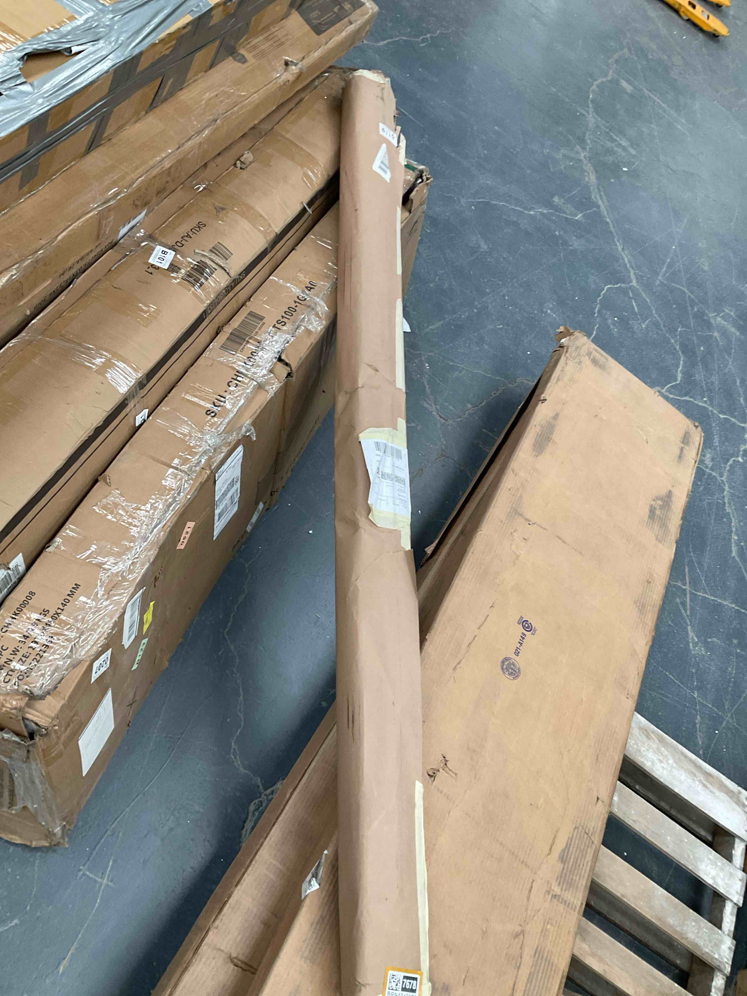 2 long pieces of white painted wood possibly to a cabinet