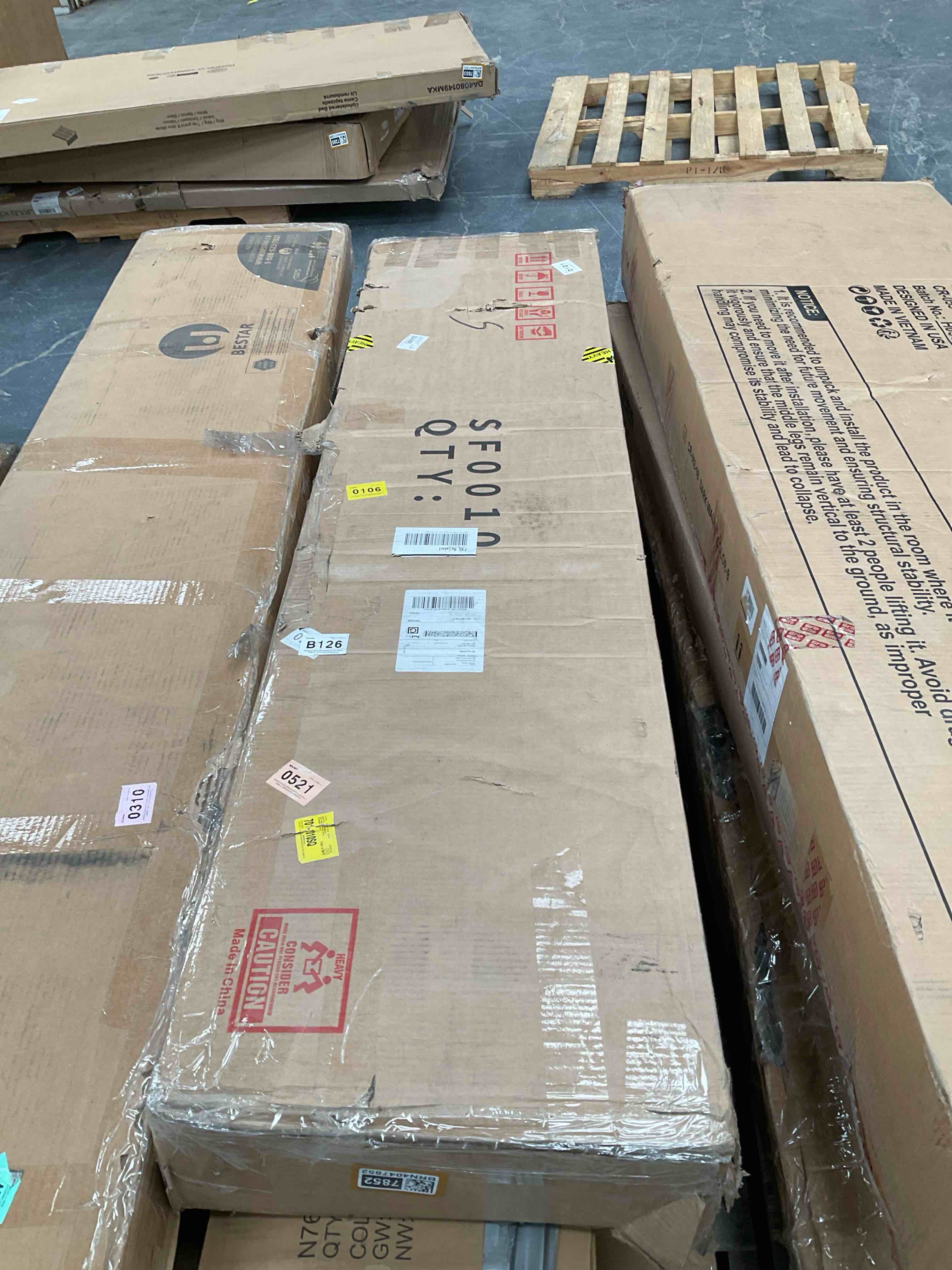 Unknown. Has dark wood colored boards and pieces more than likely a shelf or bookcase.