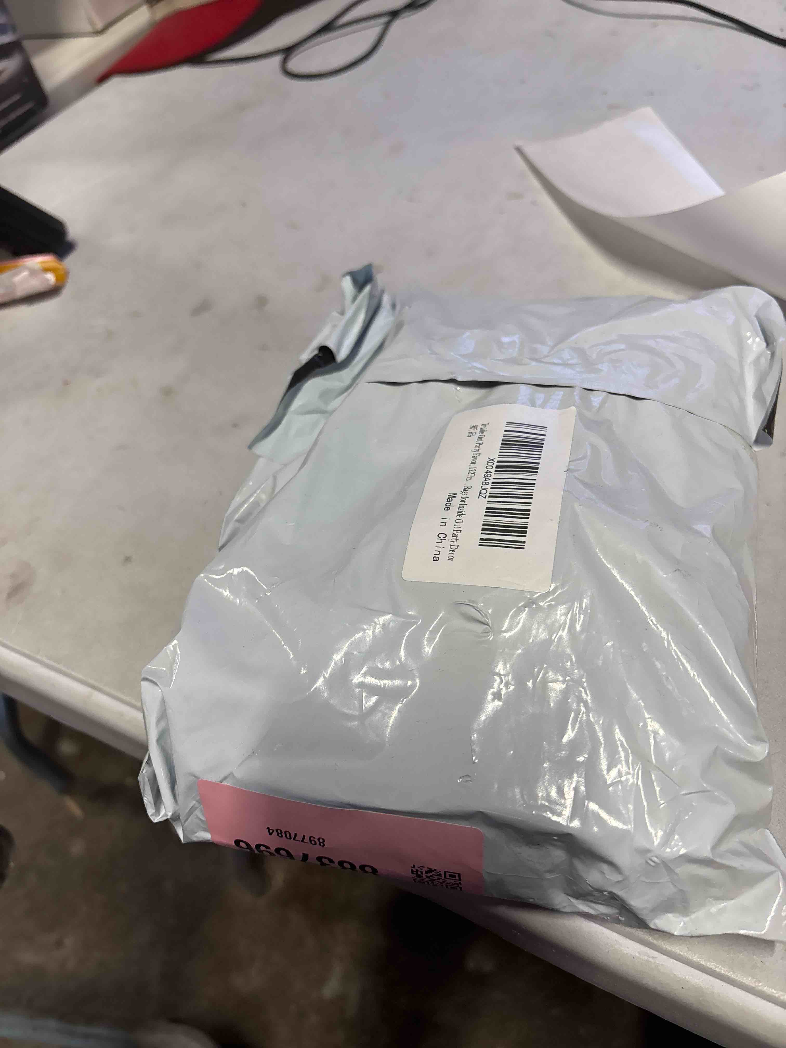 Condition photo showing New/Like New for Inside out party favor 122 pcs