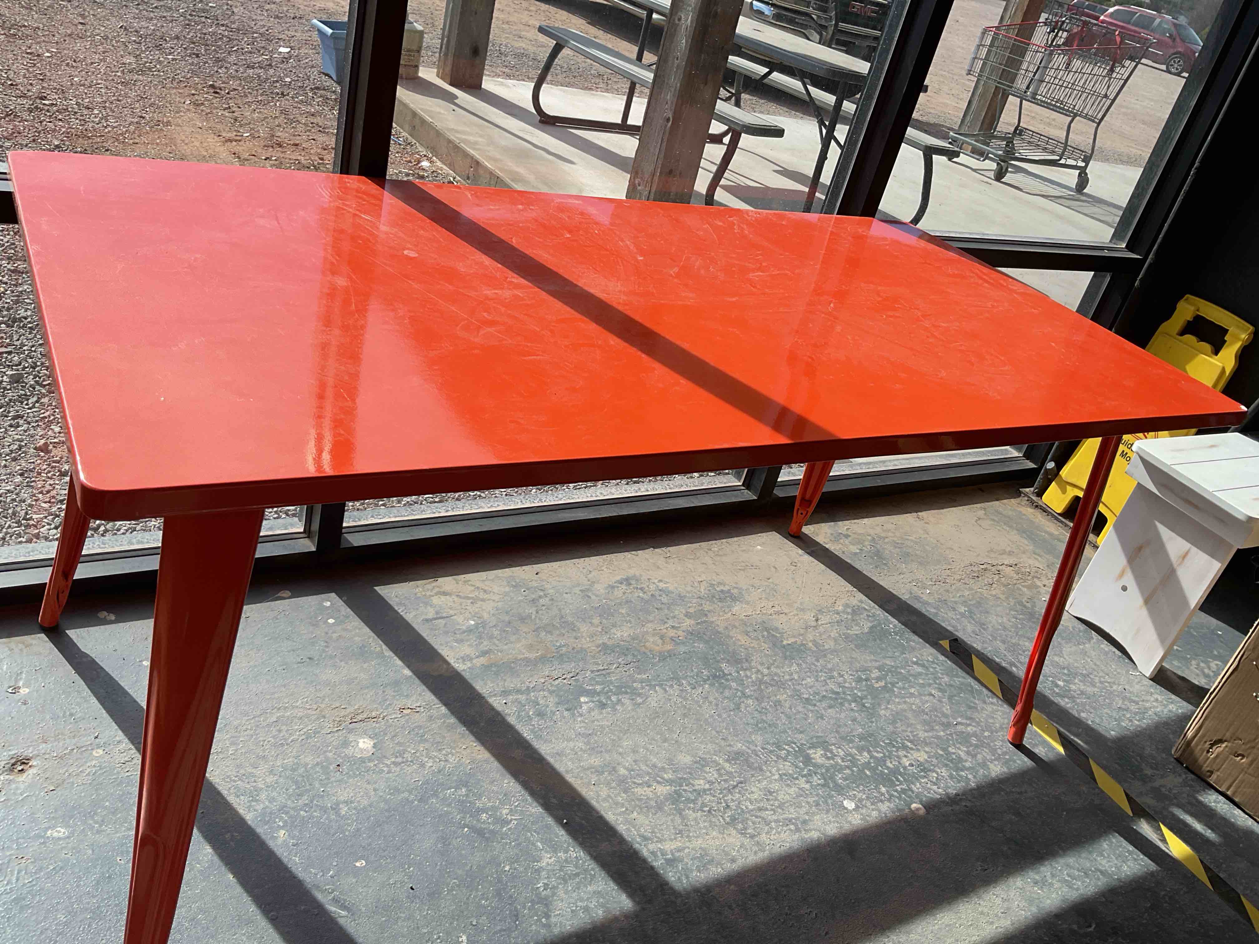 Condition photo showing Good Condition for ~63 Inch Metal Orange Table