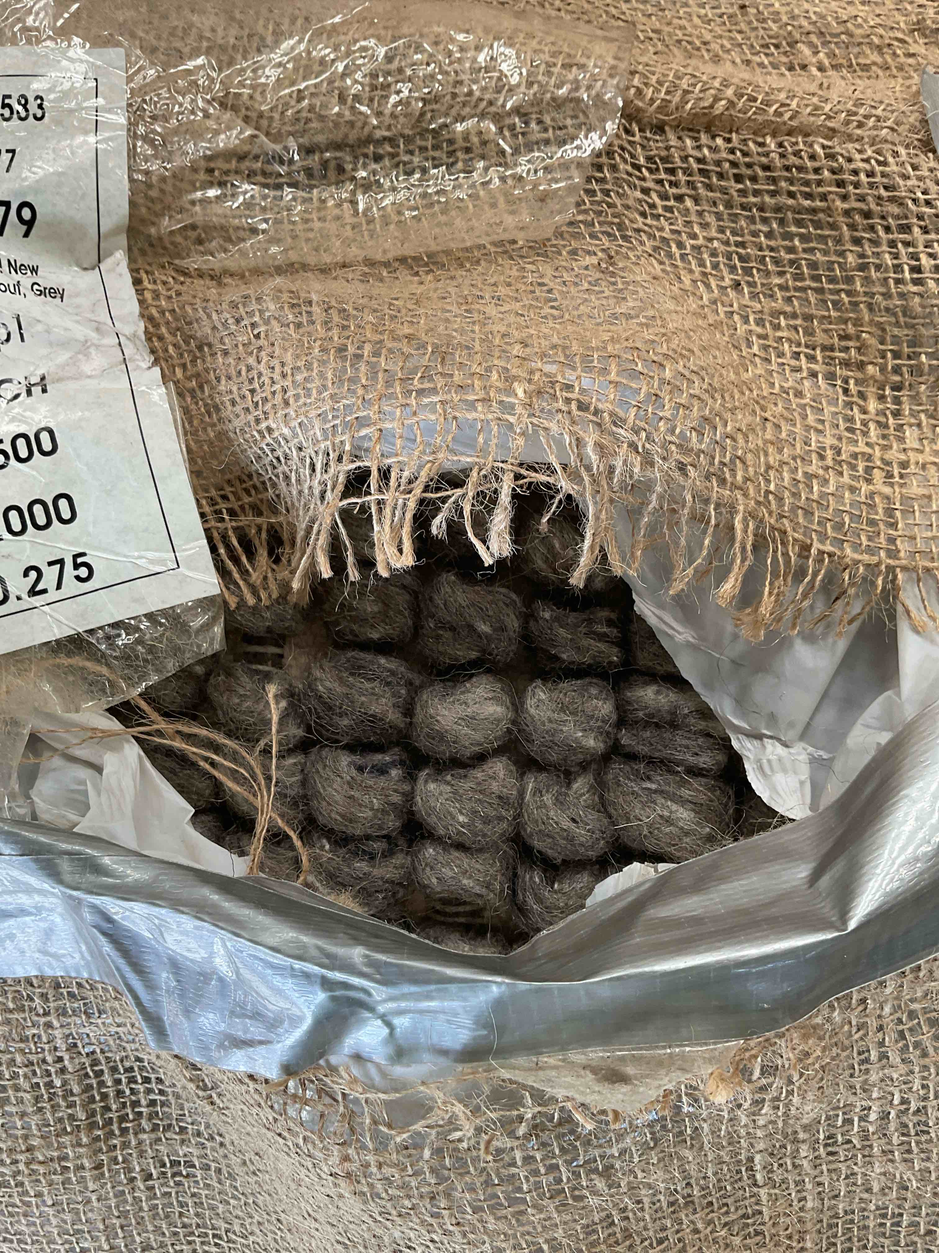 Condition photo showing Good Condition for 24”Sq X 16”H New ZealandWool Pouf Grey