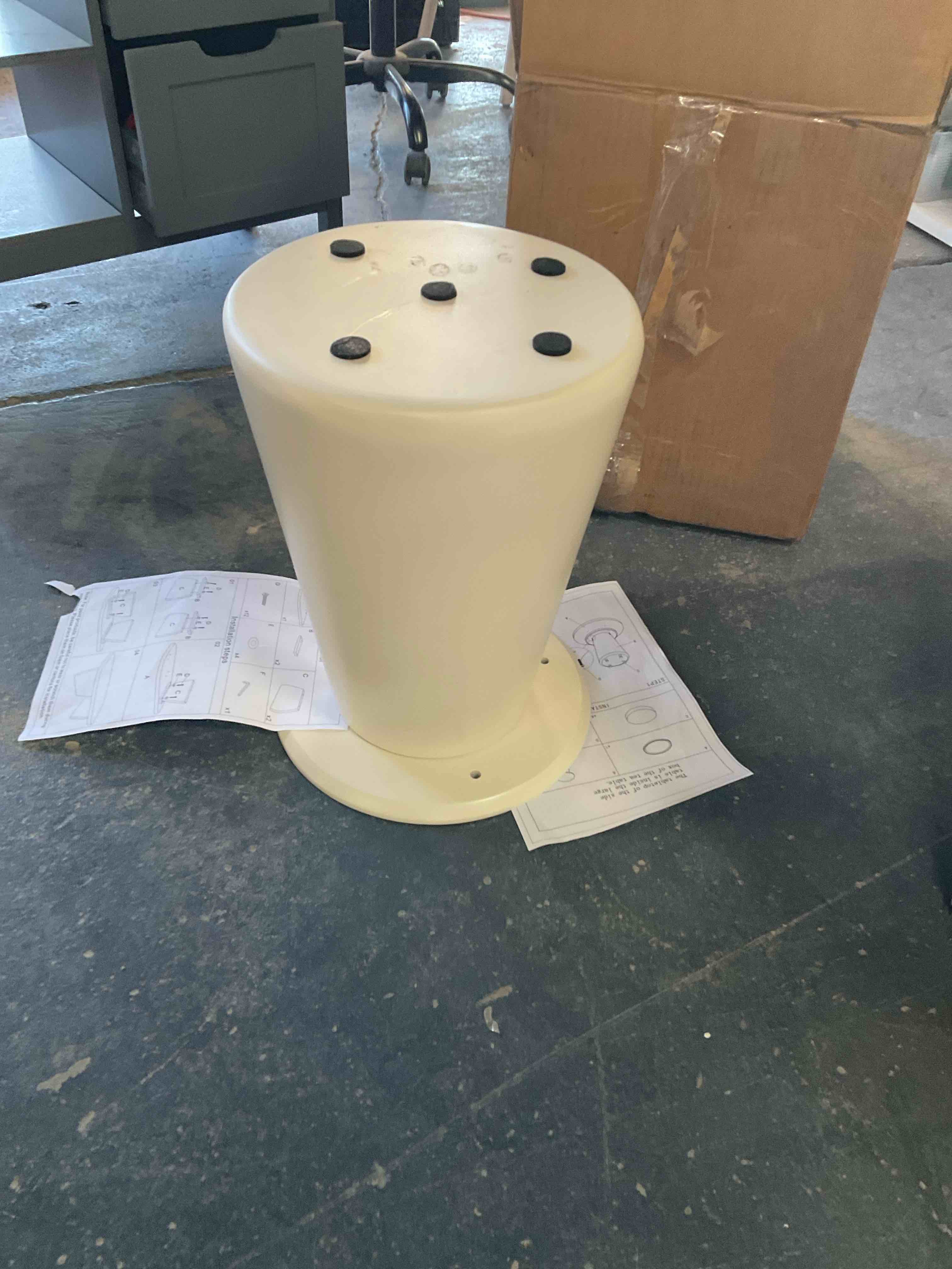 Small white pedestal base for coffee table