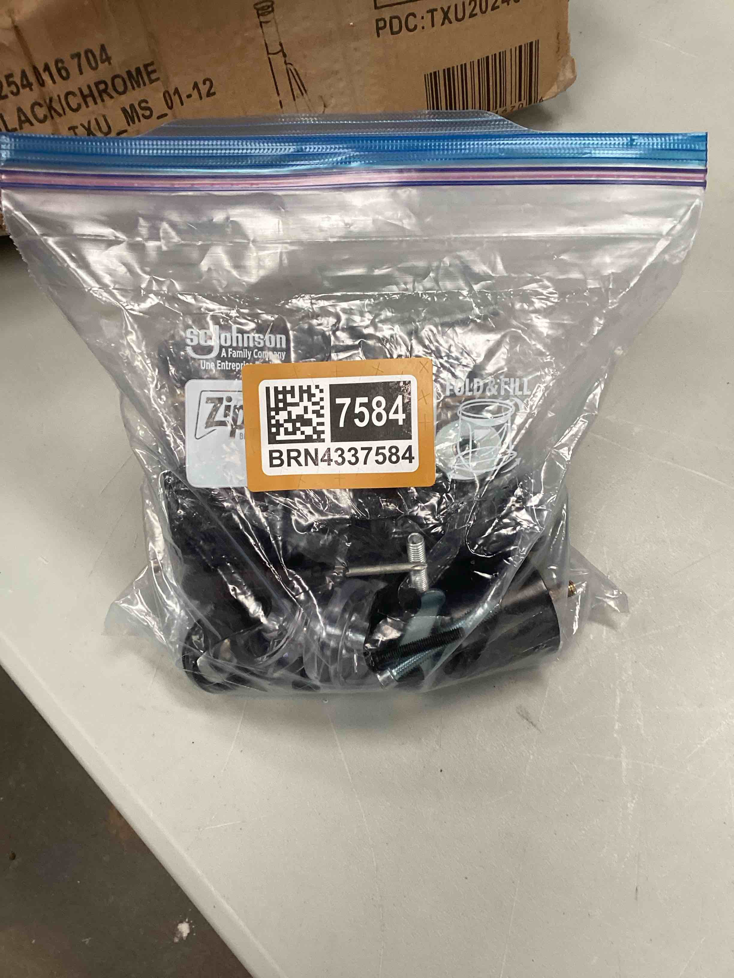 Bag of miscellaneous furniture pieces and parts