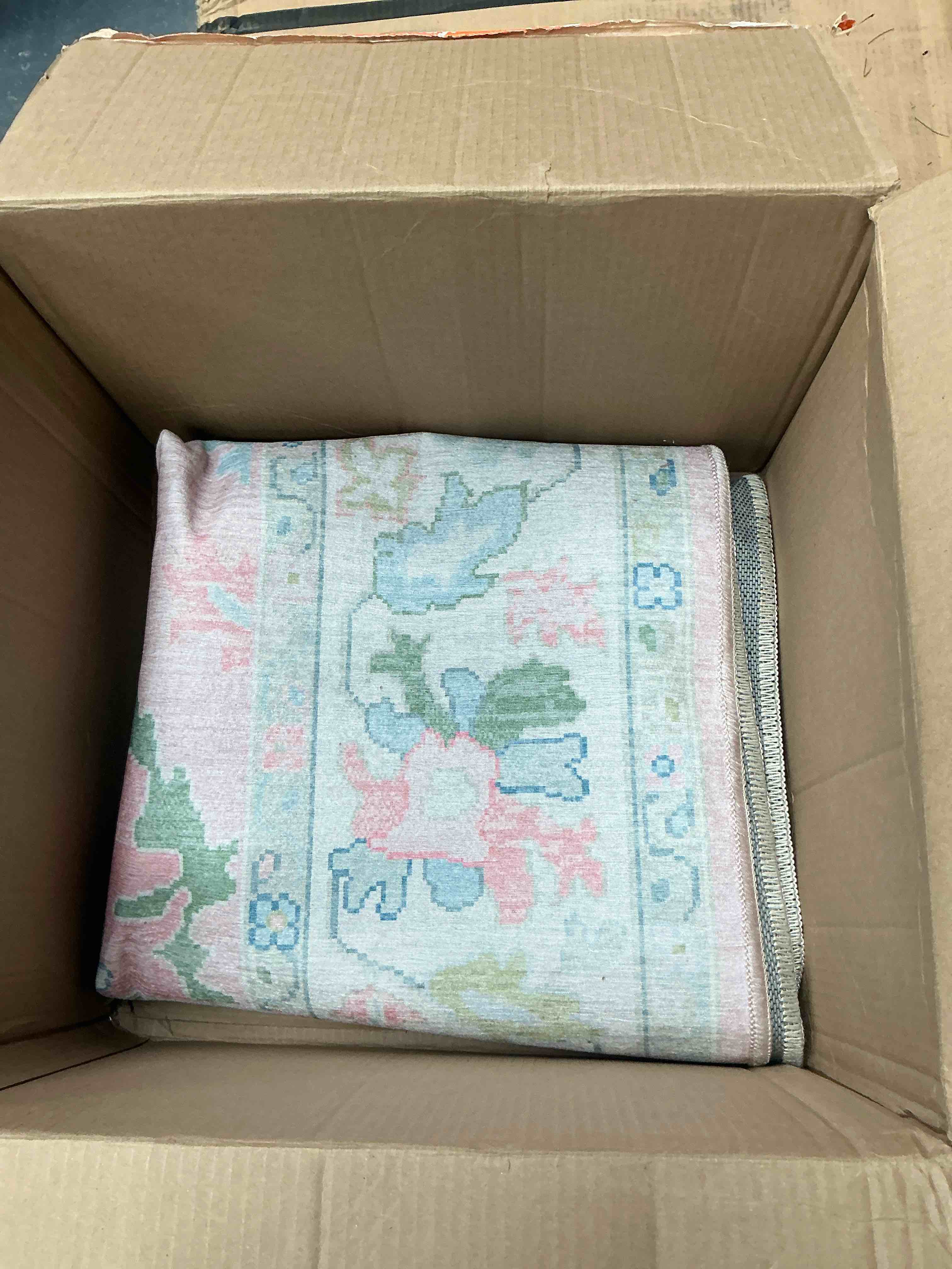 AREA RUG SIZE UNKNOWN