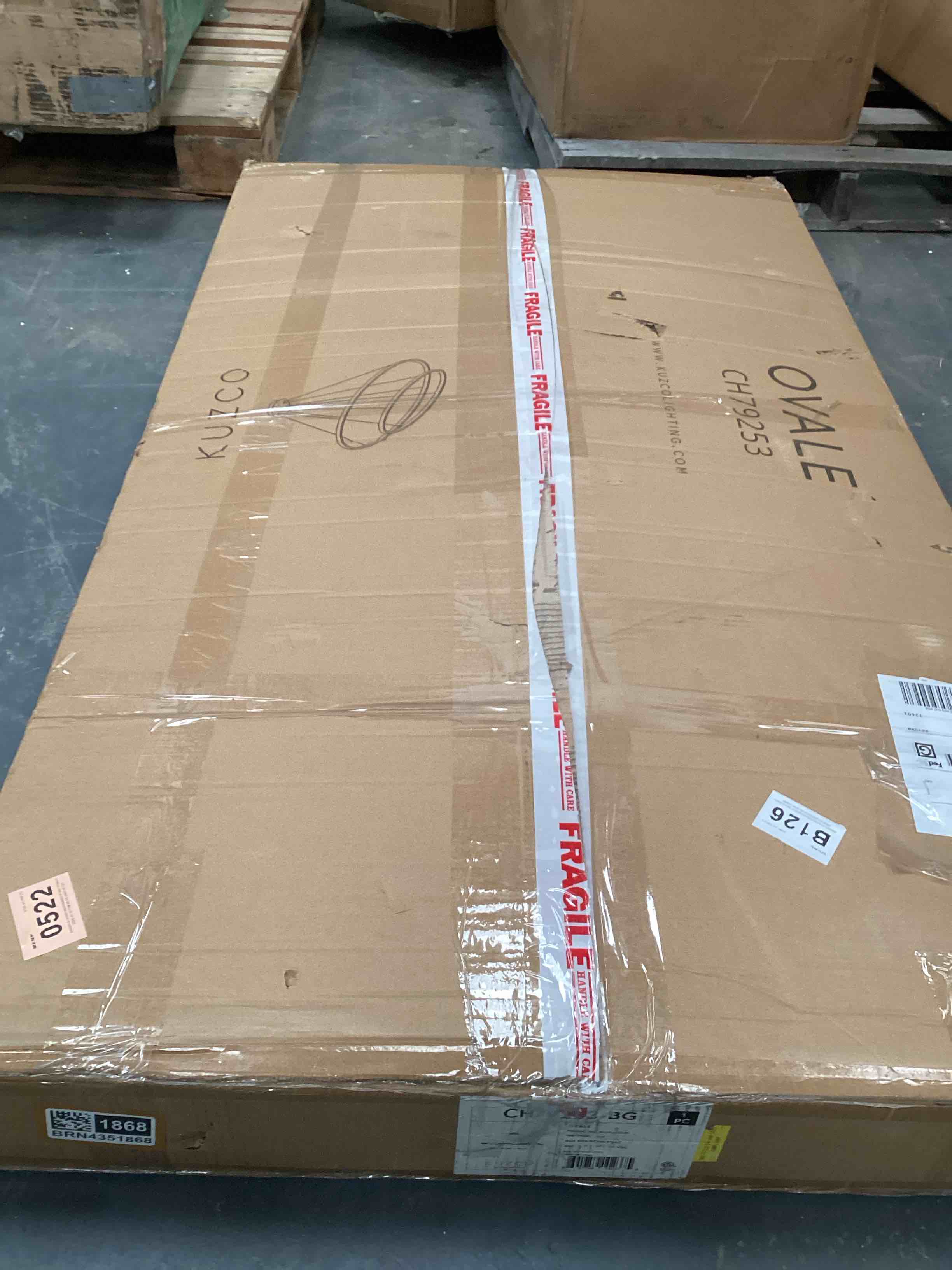 Condition photo showing Good Condition for Kuzco brushed Gold 72w lighting fixture/Chandelier