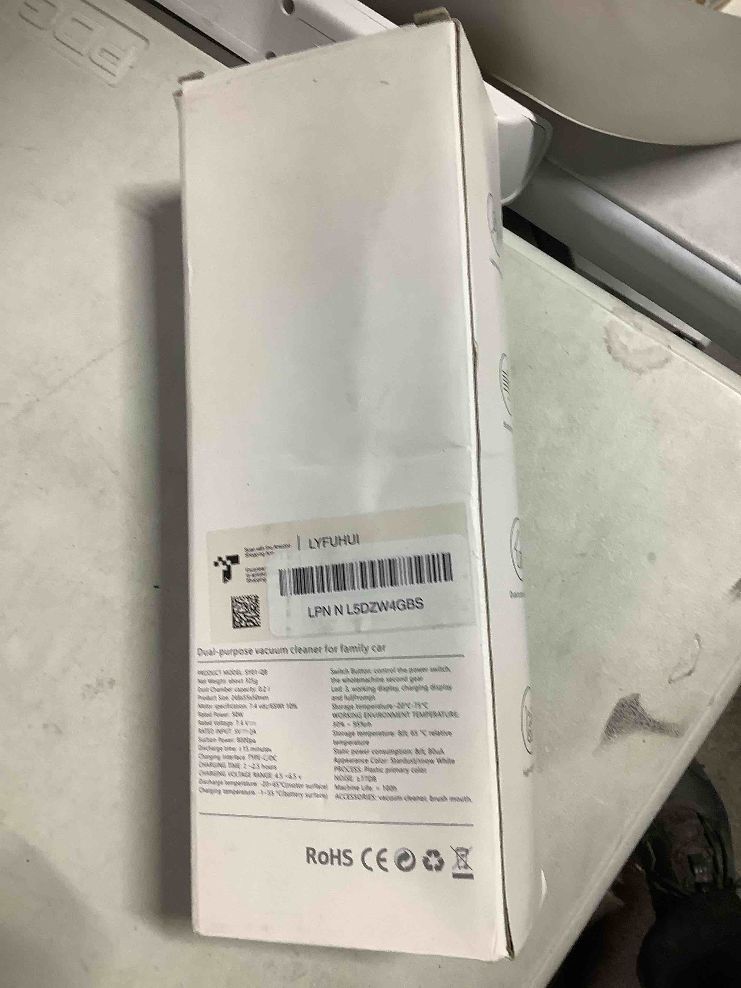 Condition photo showing As Is for portable vacuum