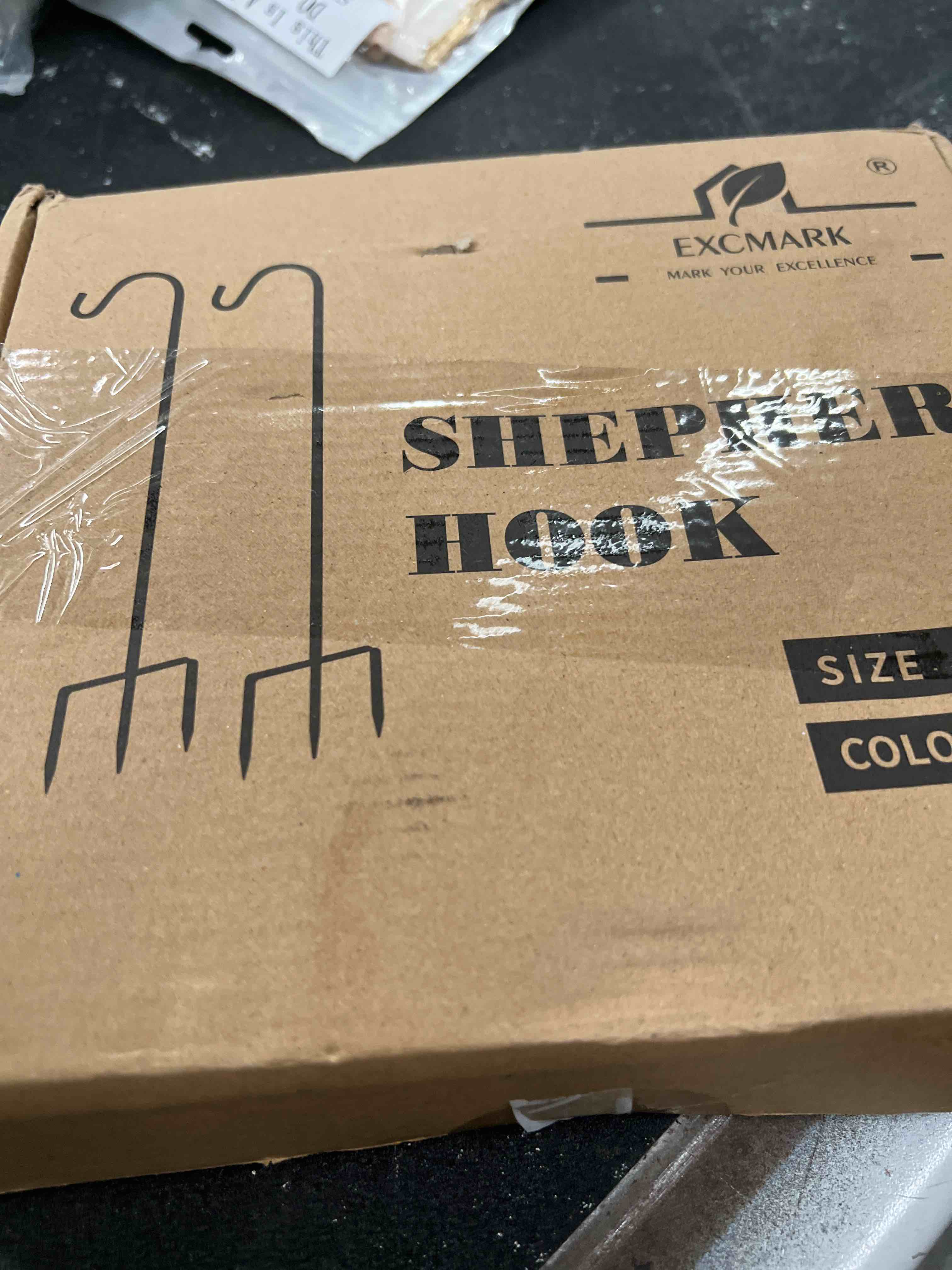 Condition photo showing Good Condition for excmark 2 pack shepherd hook adjustable height 31/24/16’’ 1/2 inch thick use at weddings, hanging solar lights, lanterns, bird feeders, metal hanger hook (black, 31 inch). u.s. patent. 31 inch black