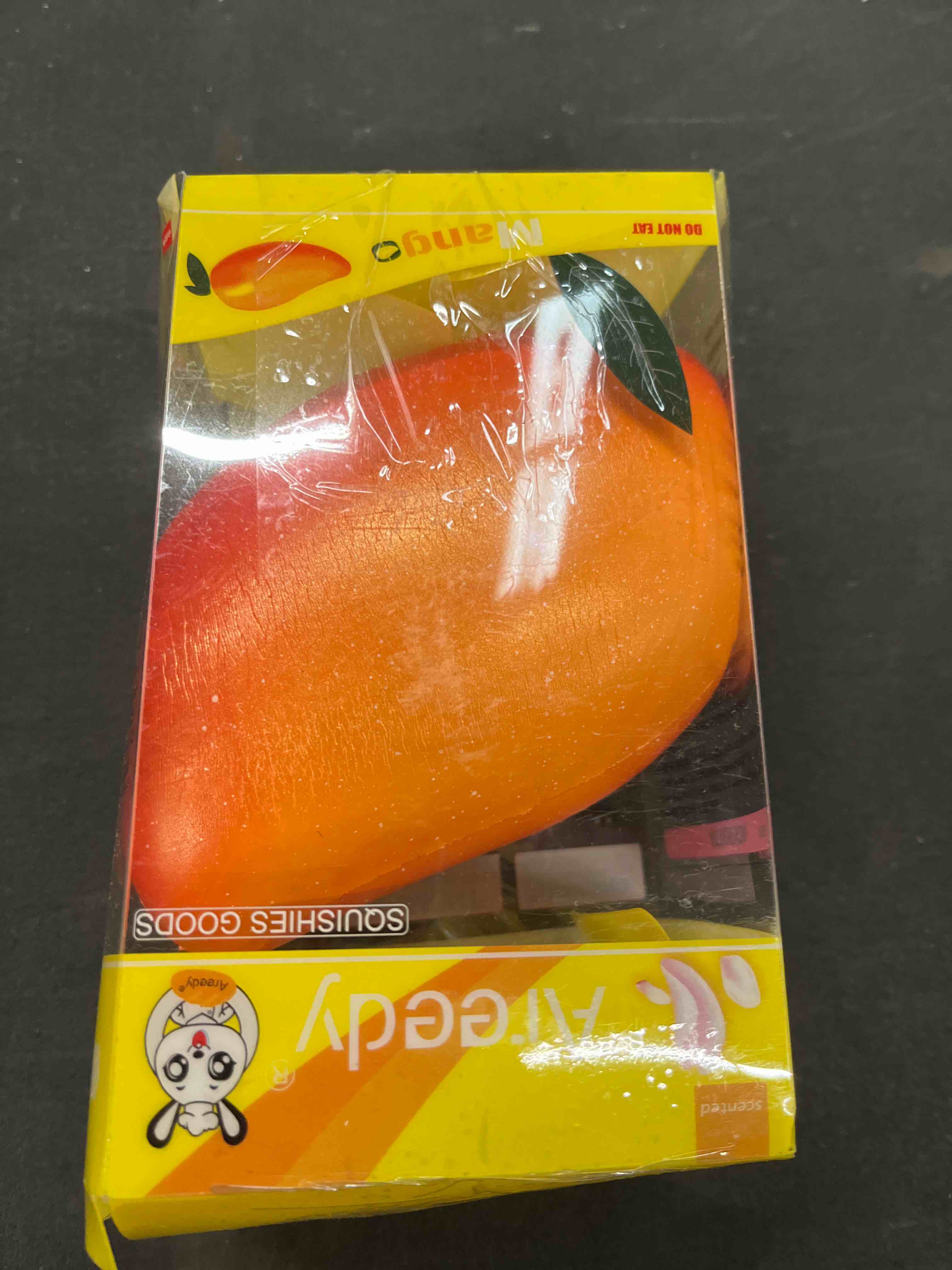 Condition photo showing Good Condition for squishy gold mango colossal slow rising scented fruit squishies