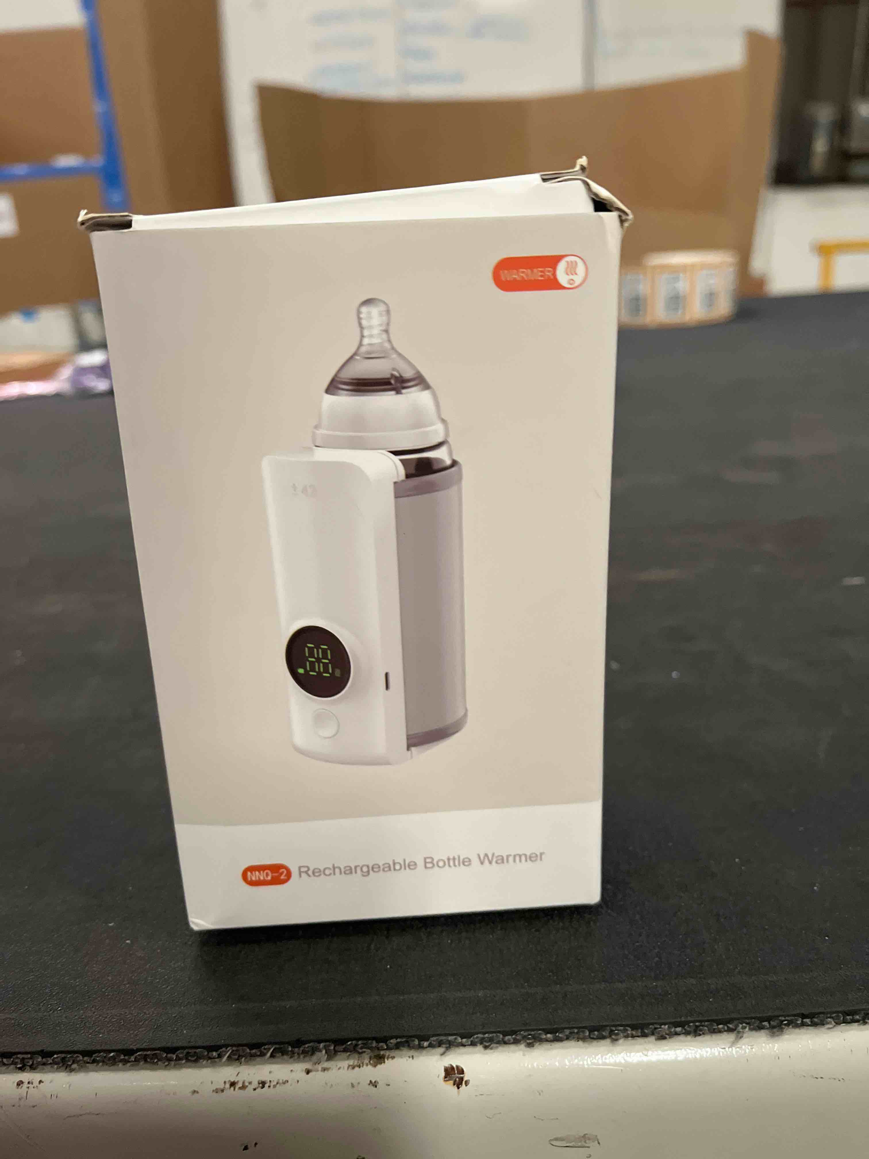 Condition photo showing Good Condition for portable bottle warmer, rapid warming with battery-powered temperature display, waterless milk warmi