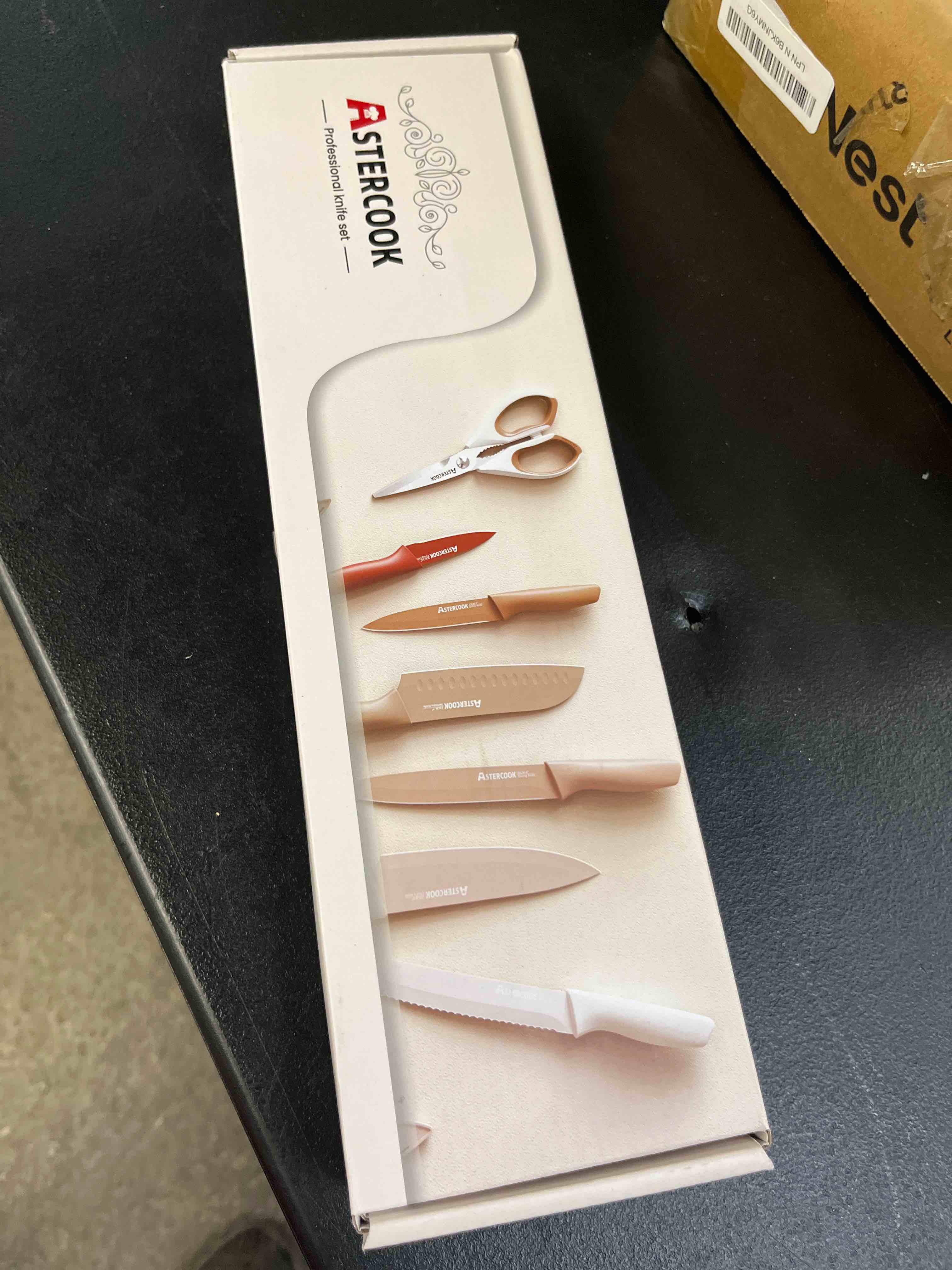 Condition photo showing Good Condition for astercook knife set, 13 pieces kitchen knives set with healthy anti-rust coating, dishwasher safe, stainless steel chef knife sets with 6 blade guards, perfect valentine's day gifts for kitchen cream large