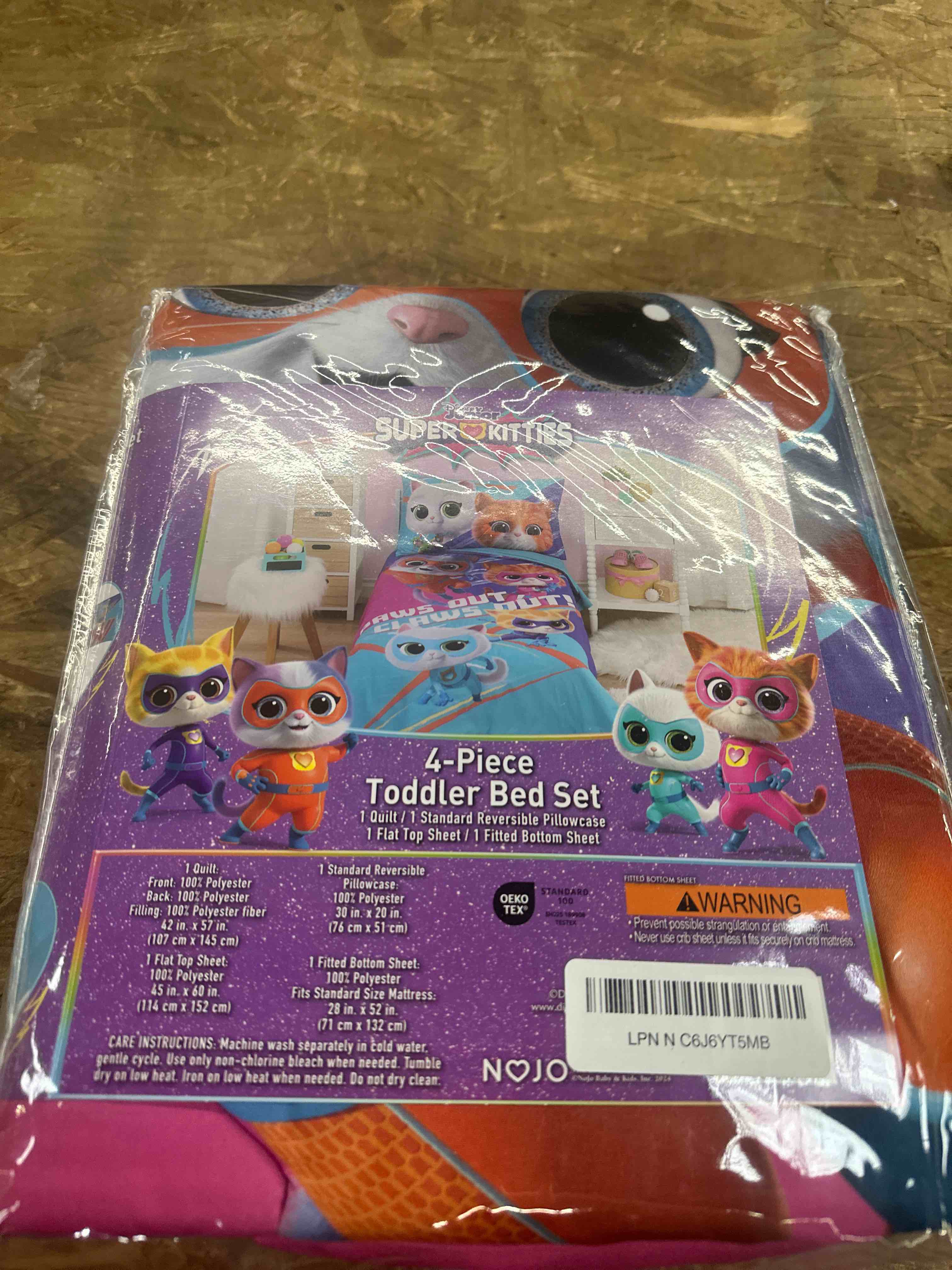 Condition photo showing Good Condition for nojo disney junior superkitties purple, pink, and aqua, with ginny, sparks, buddy, and bitsy 4 piece toddler bed set - comforter, fitted bottom sheet, flat top sheet, and reversible pillowcase