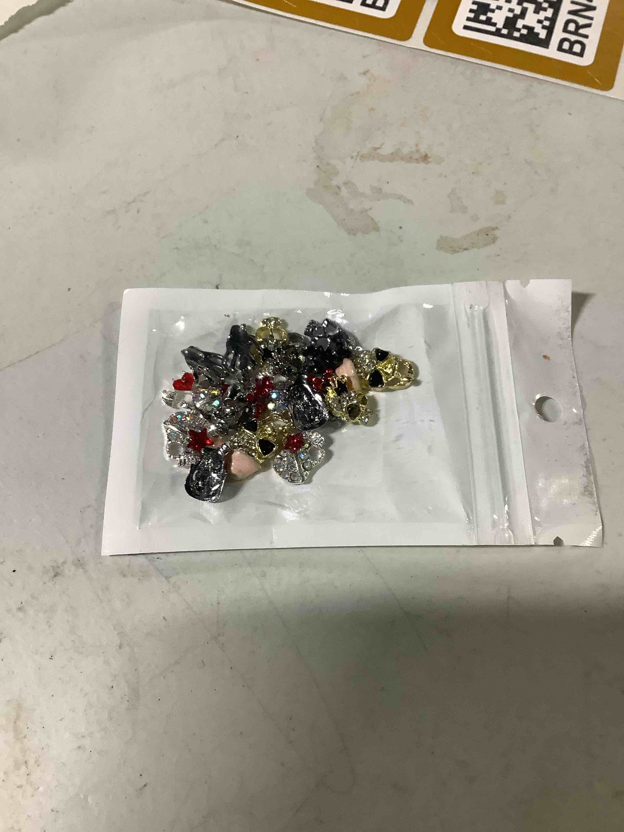 Condition photo showing Good Condition for   miscellaneous skull nail charms