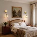 battery operated armed wall sconce with tulip glass shade, remote control sconces