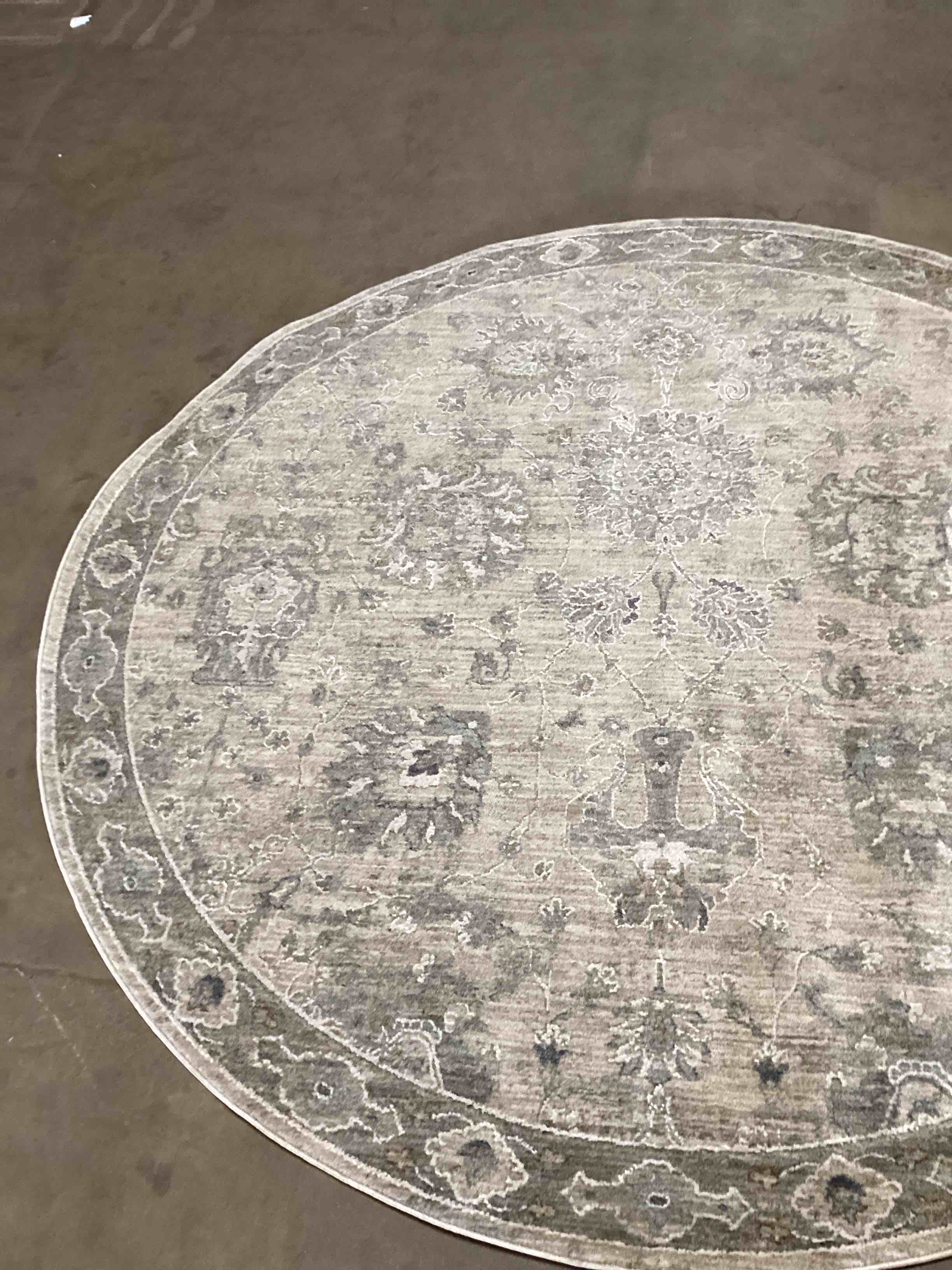 Condition photo showing Good Condition for 78” diameter rug gray/blue avante garde