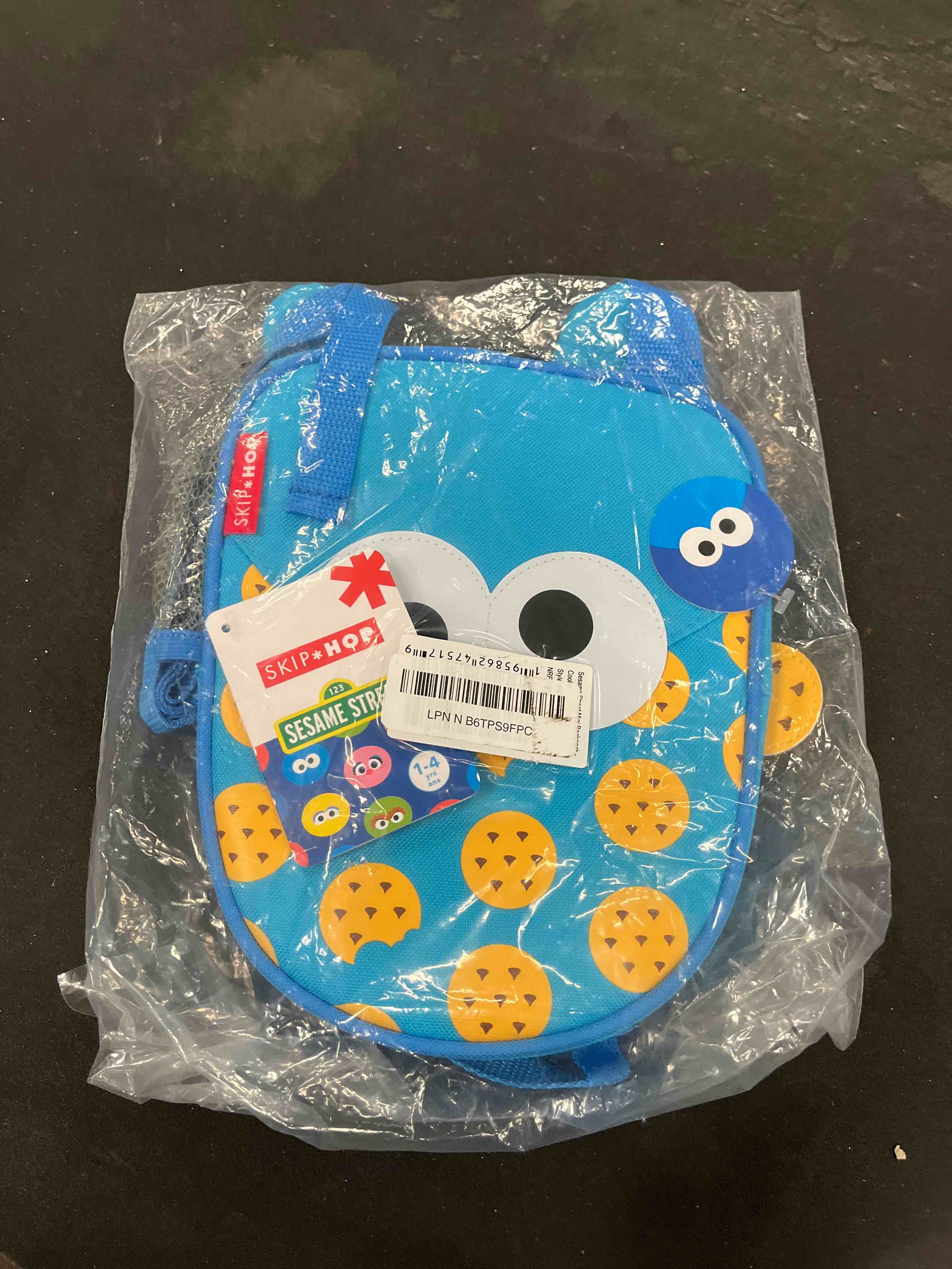 Condition photo showing Good Condition for skip hop x sesame street toddler backpack with safety harness, ages 1+, cookie monster