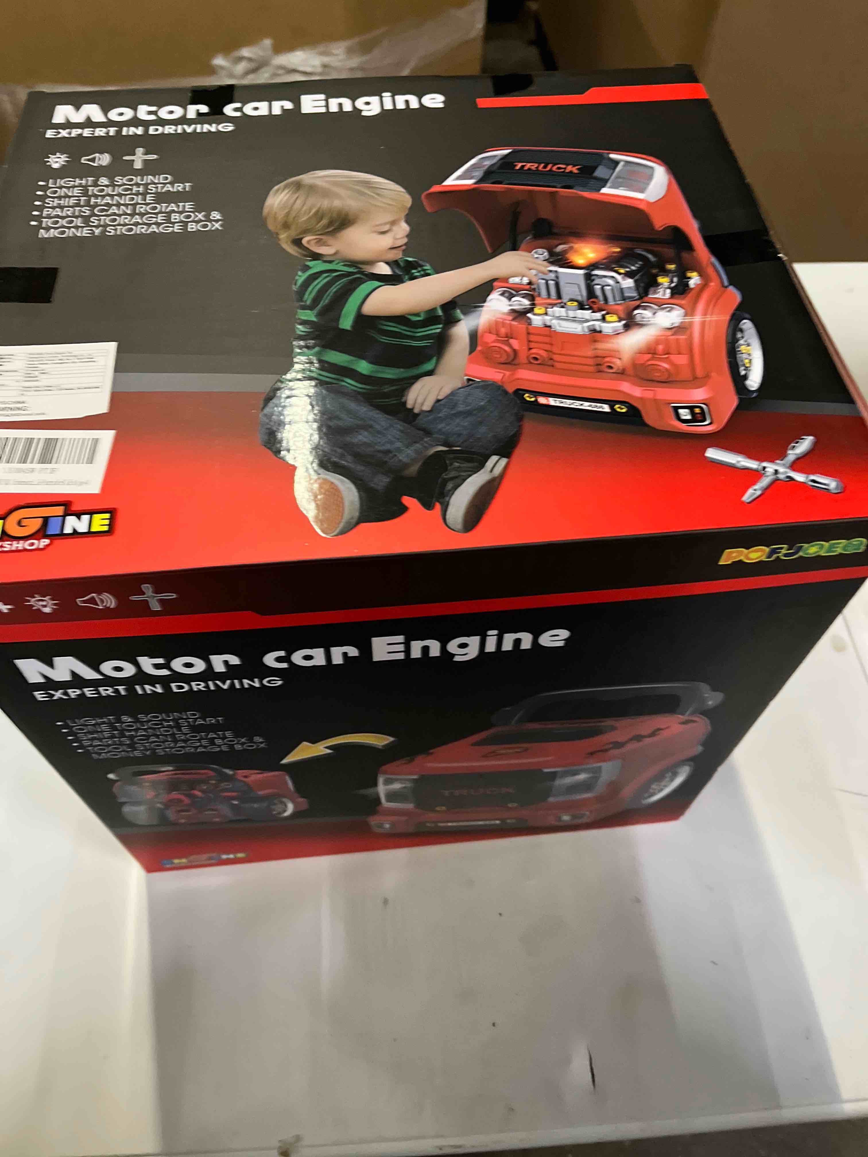 Condition photo showing Good Condition for pofjoeq interactive truck engine toy with removable parts lights & sounds, aspiring young mechanic set- spark creativity & fine motor skills - perfect car toys gift for toddlers 3-5 boys (red)