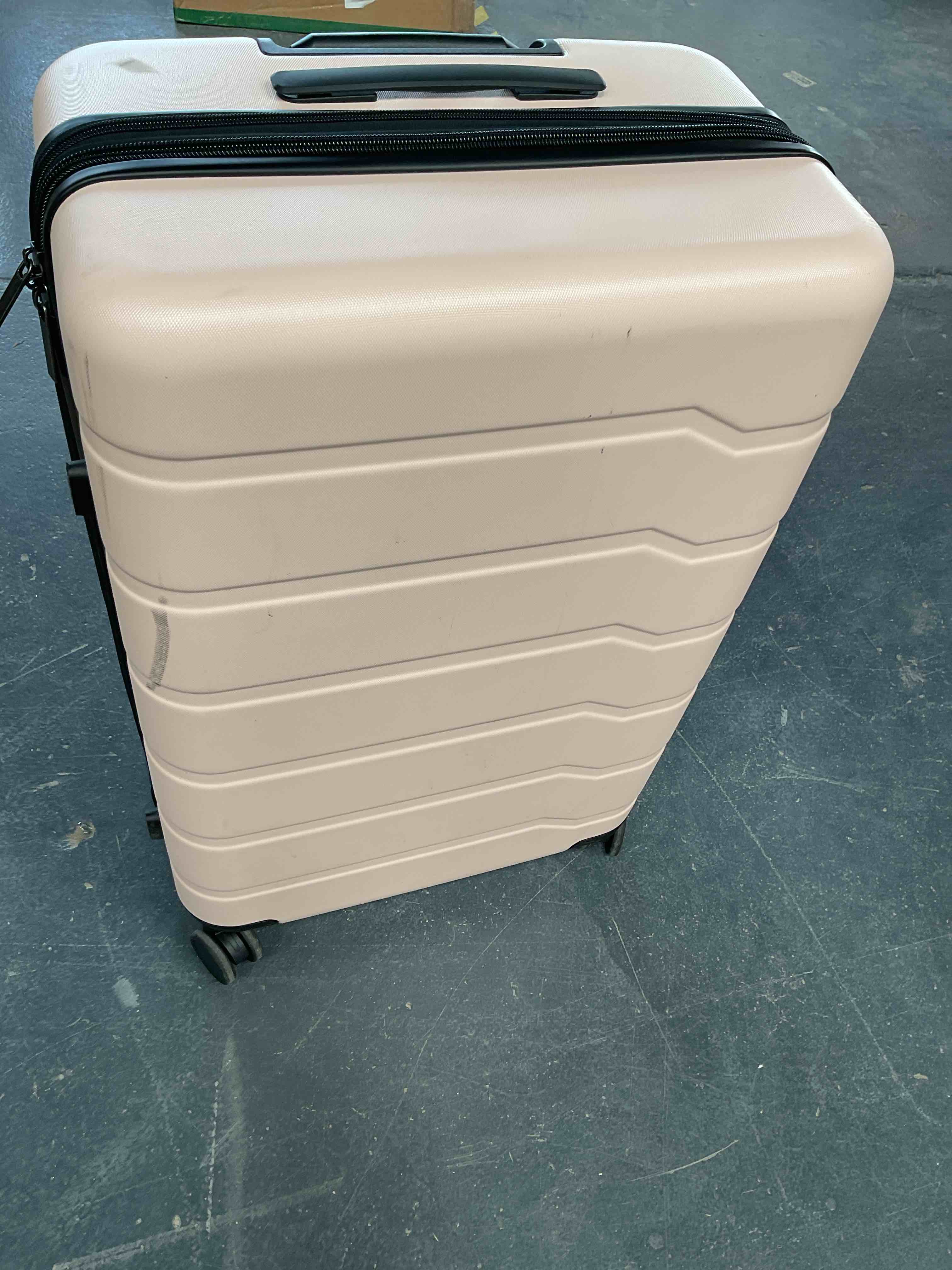 Condition photo showing Good Condition for pink suitcase