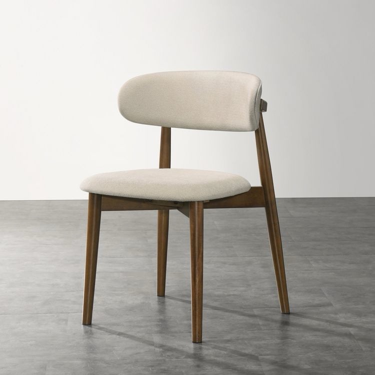 Dark wood dining table chair with off-white upholstery 